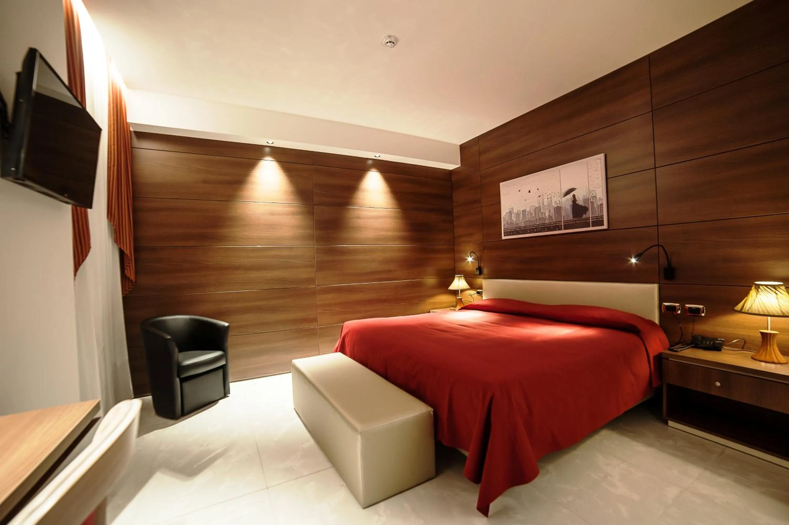 Bedroom in Family Center Hotel