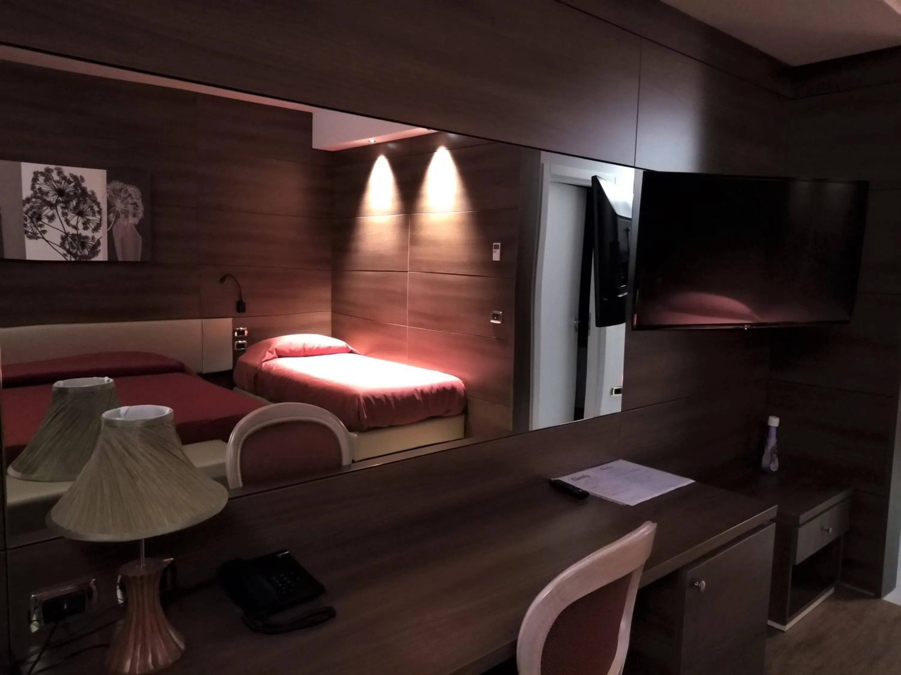 Bedroom, Bed in Family Center Hotel