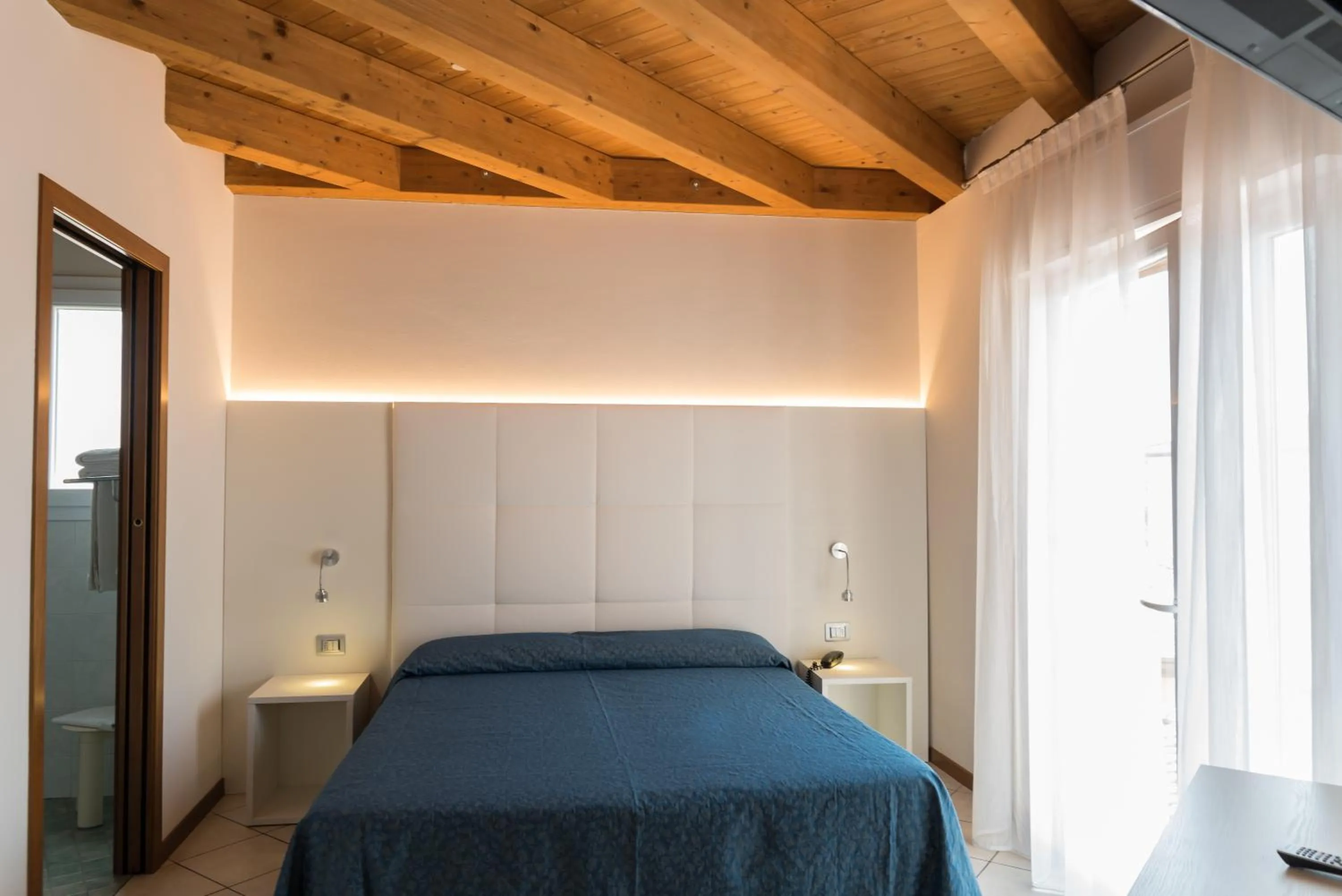 Bed in Hotel Residence Mara