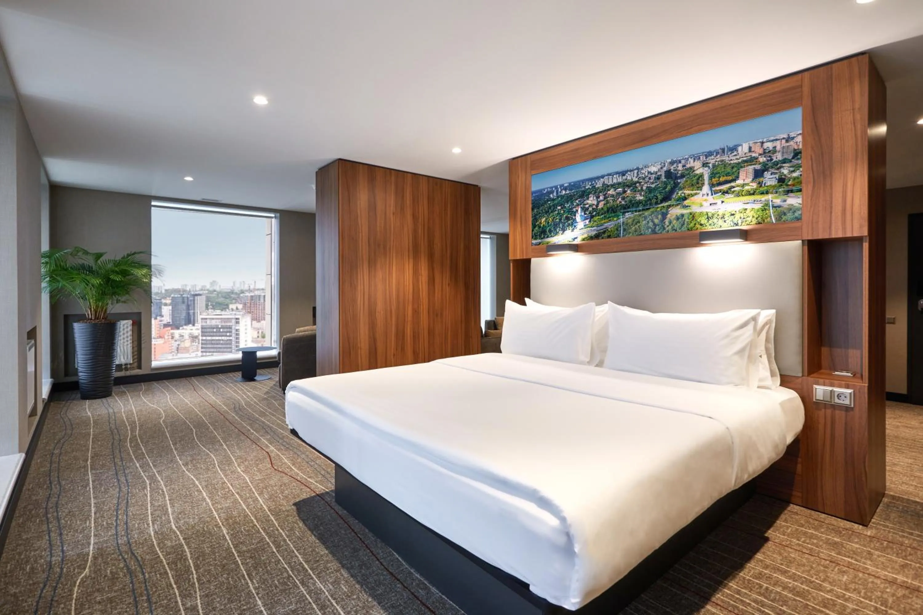 Bed in Sky Loft Hotel Kyiv by Rixwell International