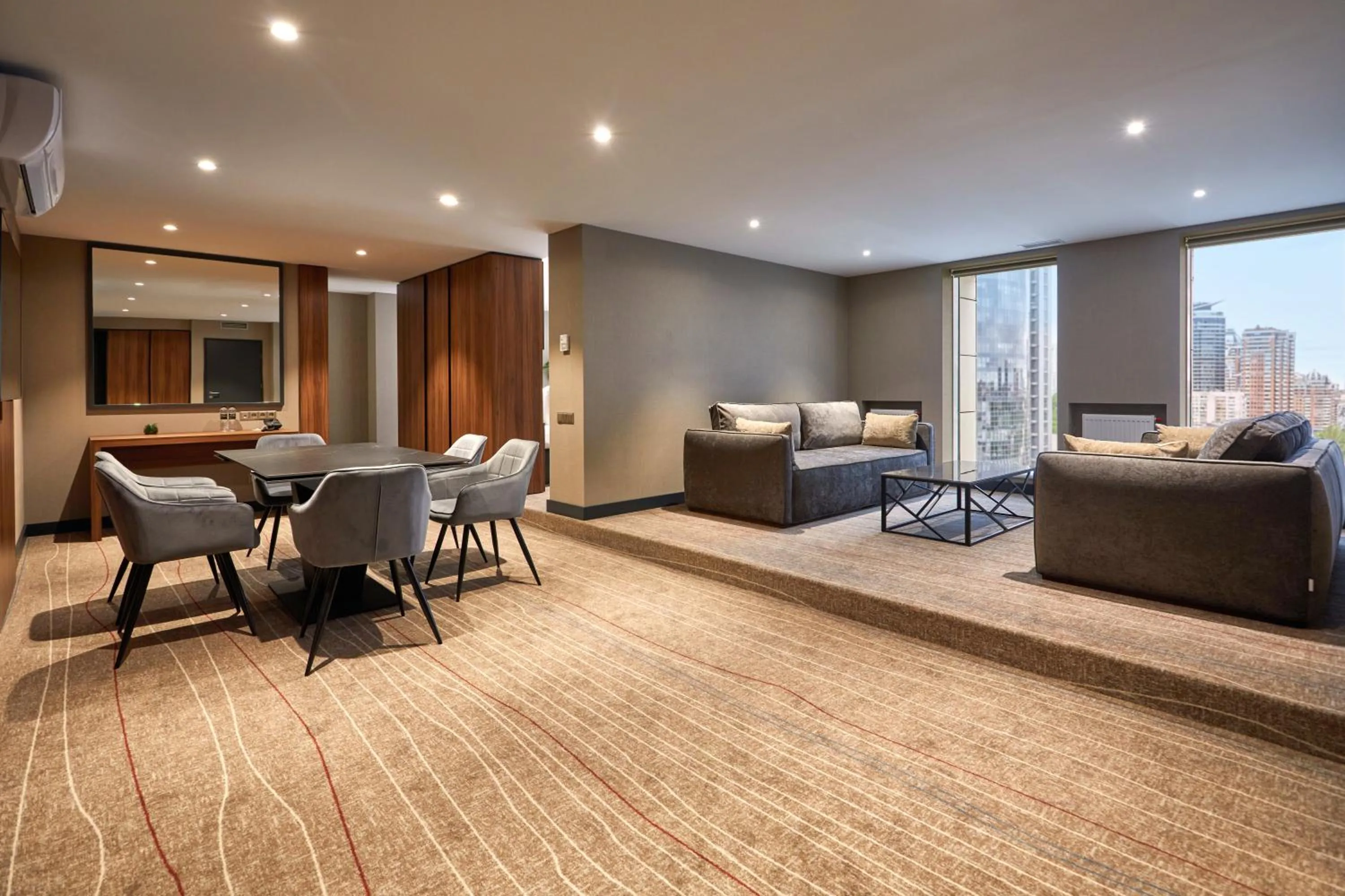 Living room in Sky Loft Hotel Kyiv by Rixwell International