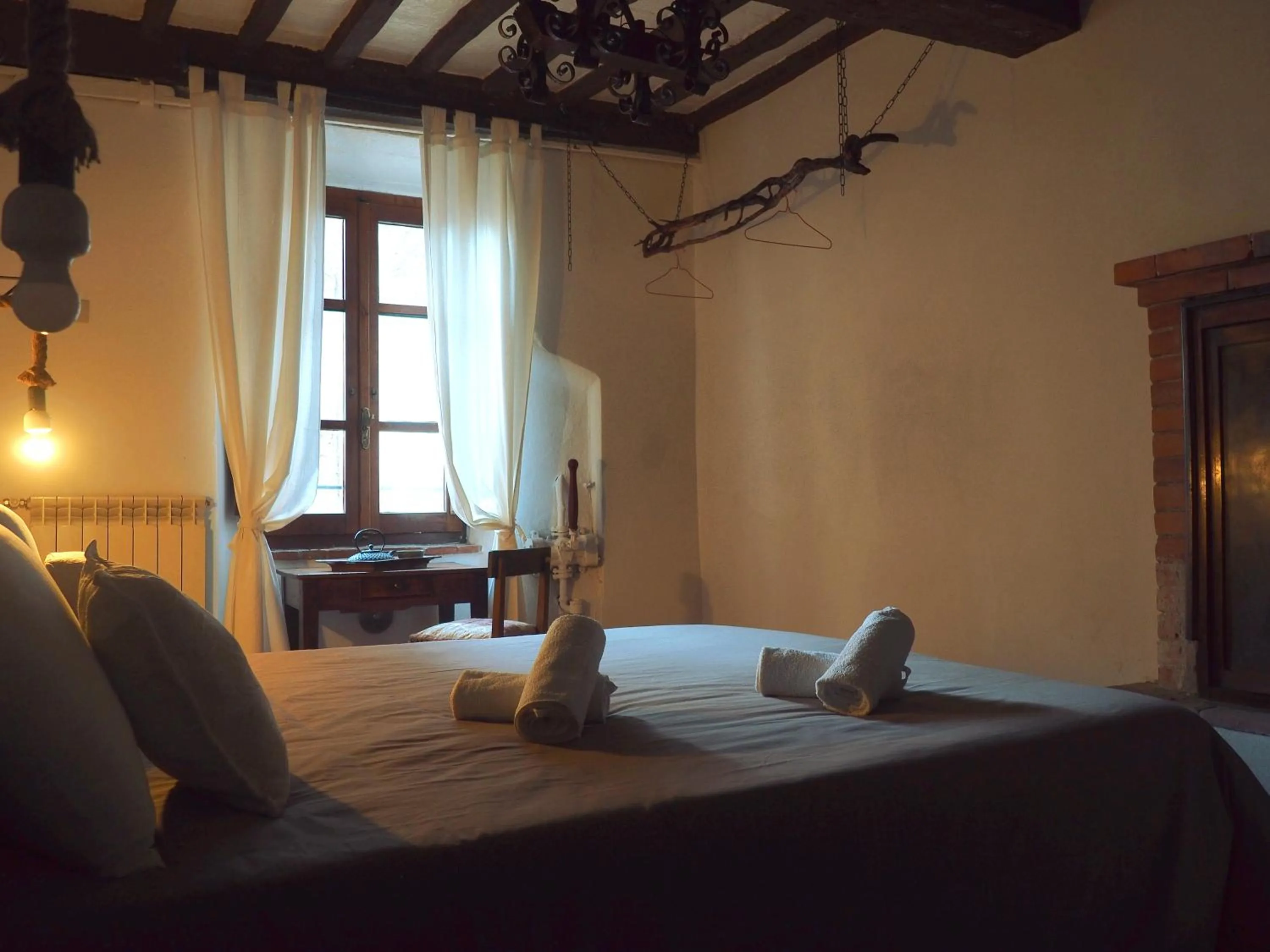 Photo of the whole room, Bed in Dulcis in Borgo