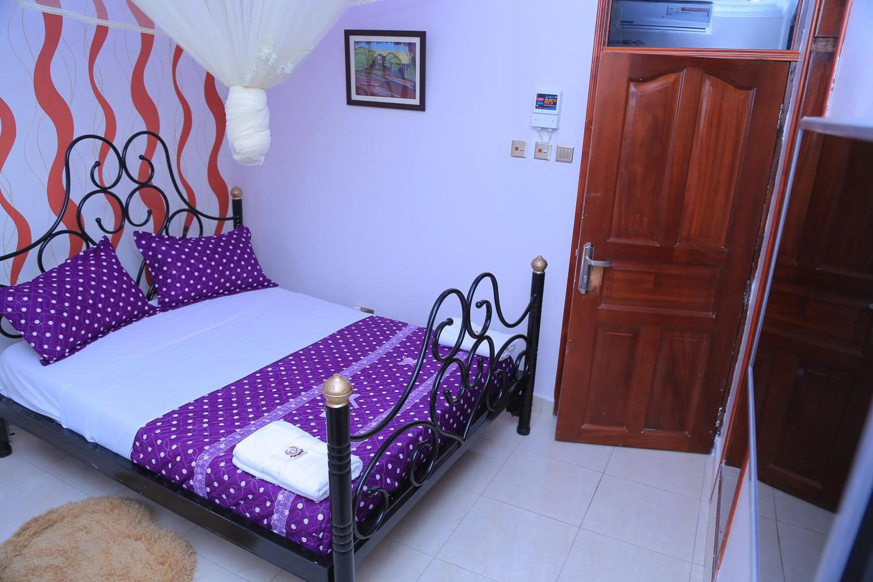 Bed in Red Sox Hotel Ltd