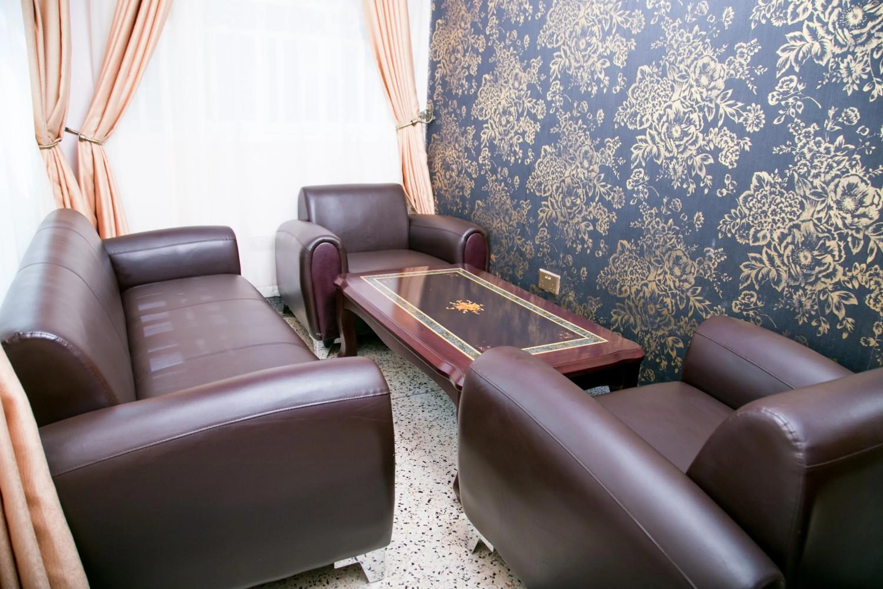 Living room in Red Sox Hotel Ltd