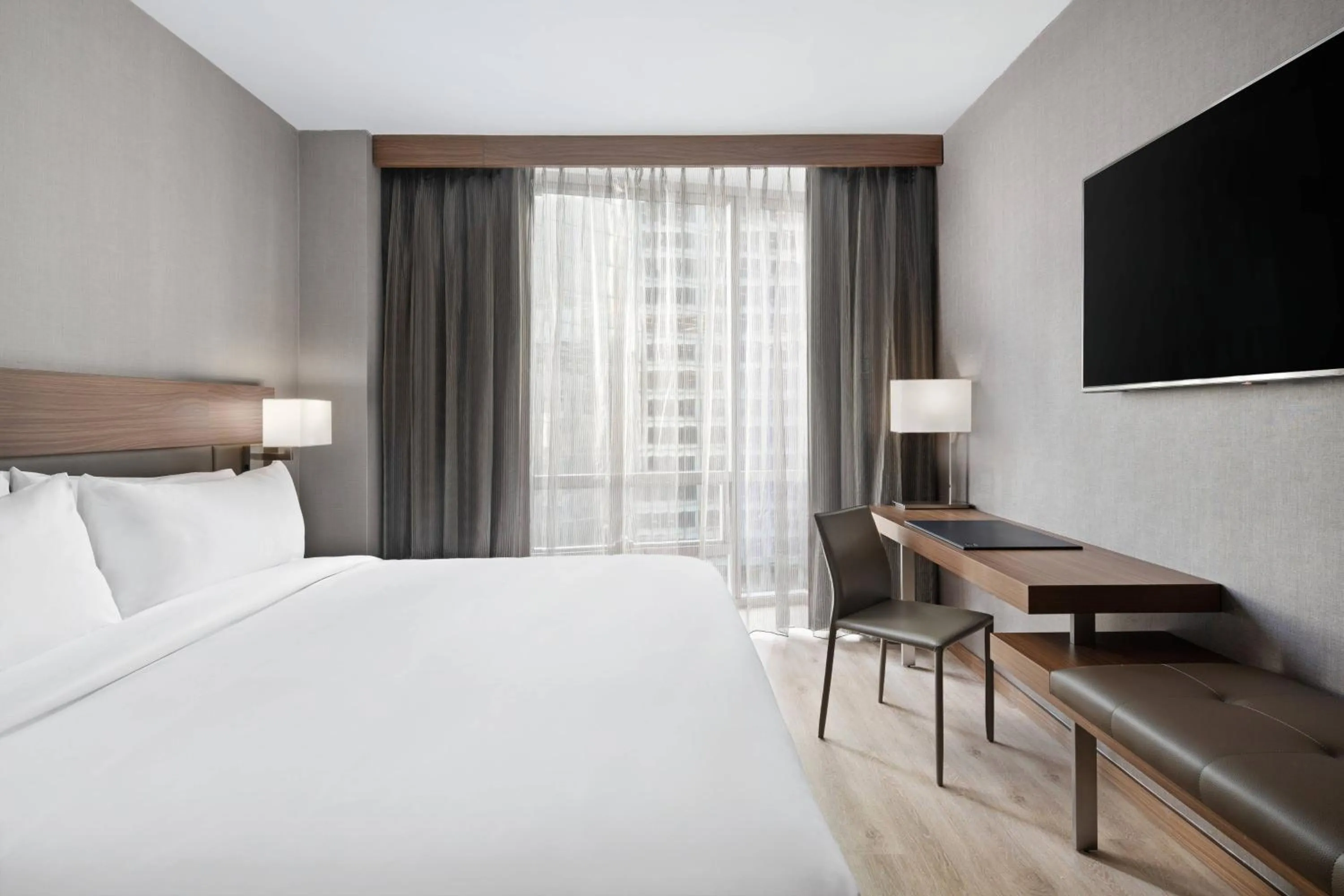 Photo of the whole room, Bed in AC Hotel by Marriott New York Downtown