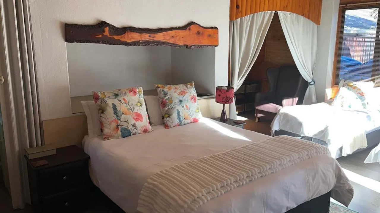 Bed in Oppi Draai Guesthouse