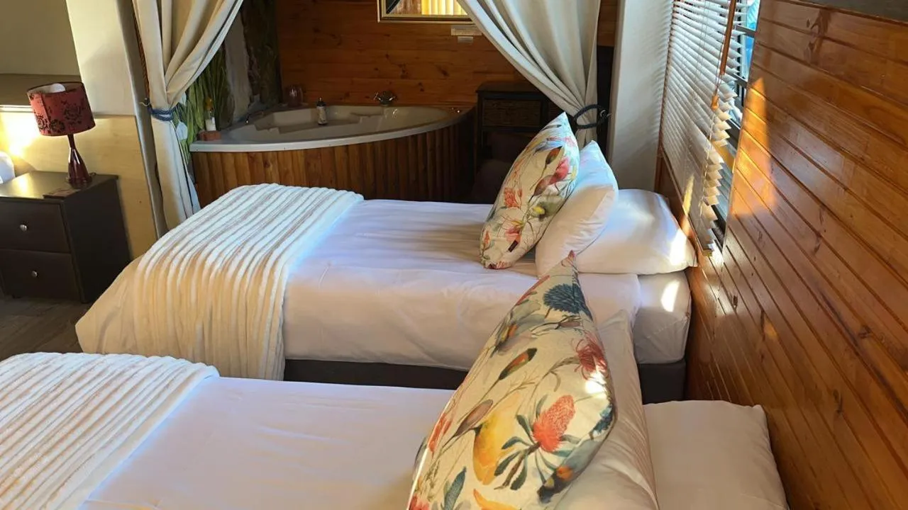 Bed in Oppi Draai Guesthouse