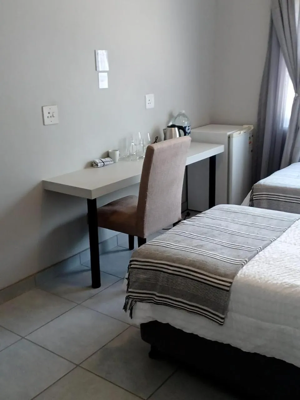 Photo of the whole room, Bed in Oppi Draai Guesthouse