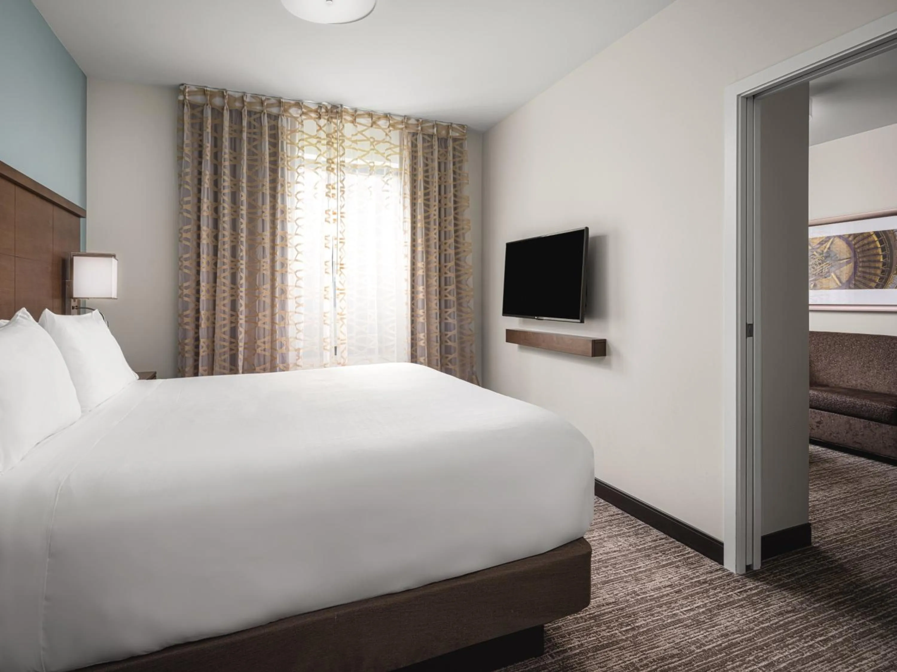 Photo of the whole room, Bed in Staybridge Suites Seattle - South Lake Union by IHG