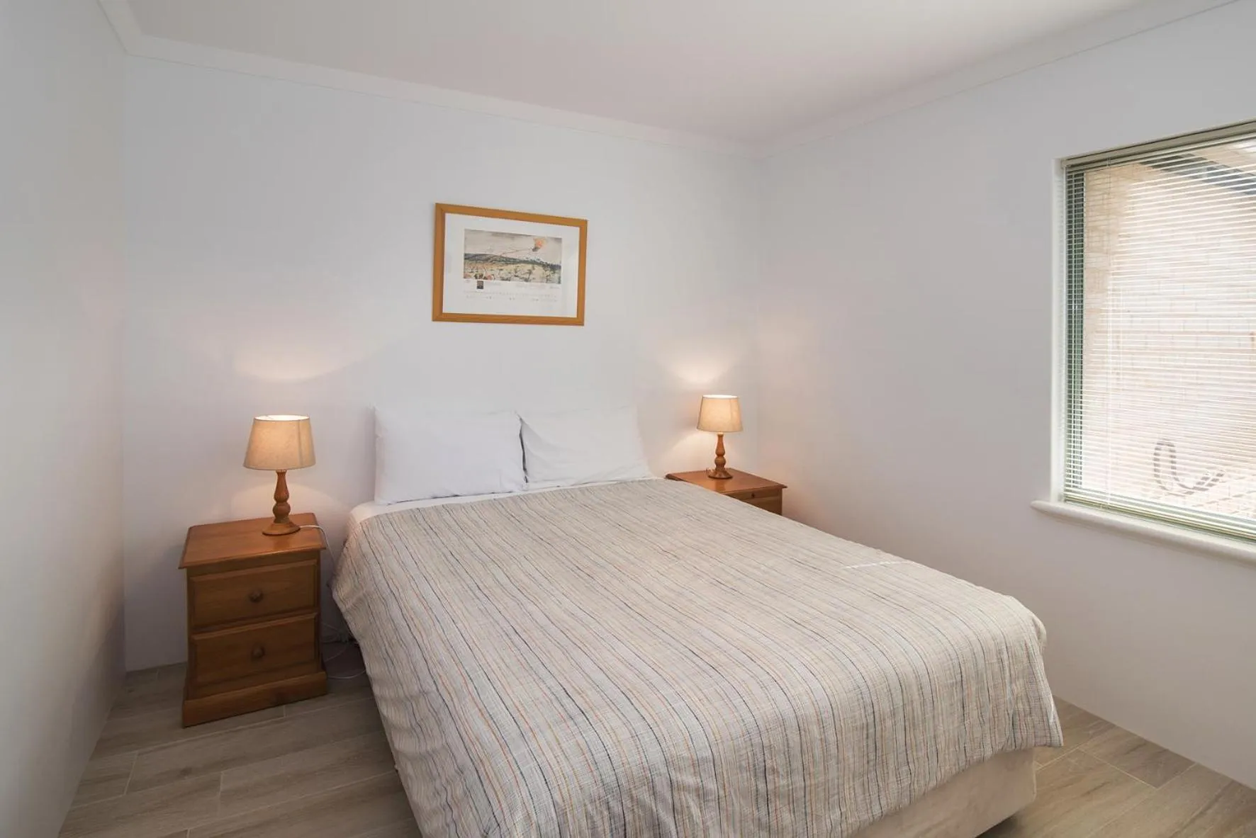 Bed in Bayshore Beachside Resort