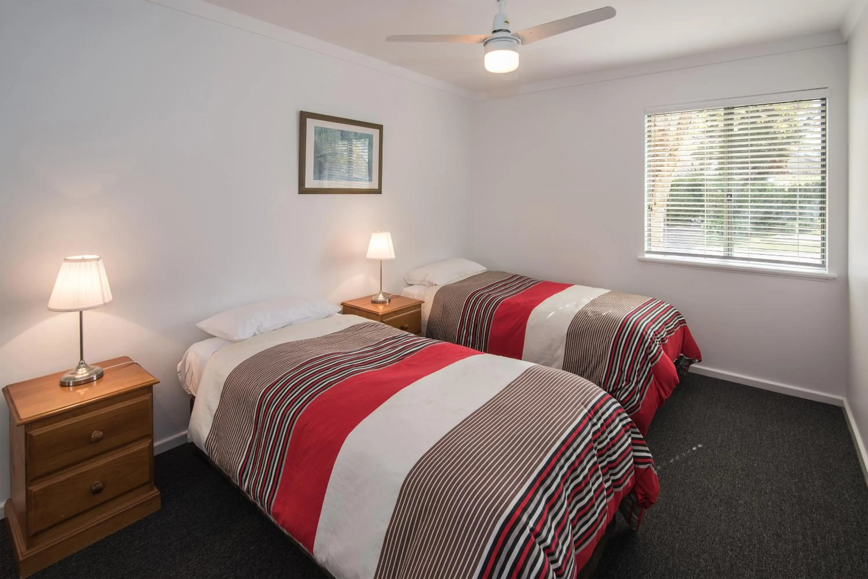 Bed in Bayshore Beachside Resort