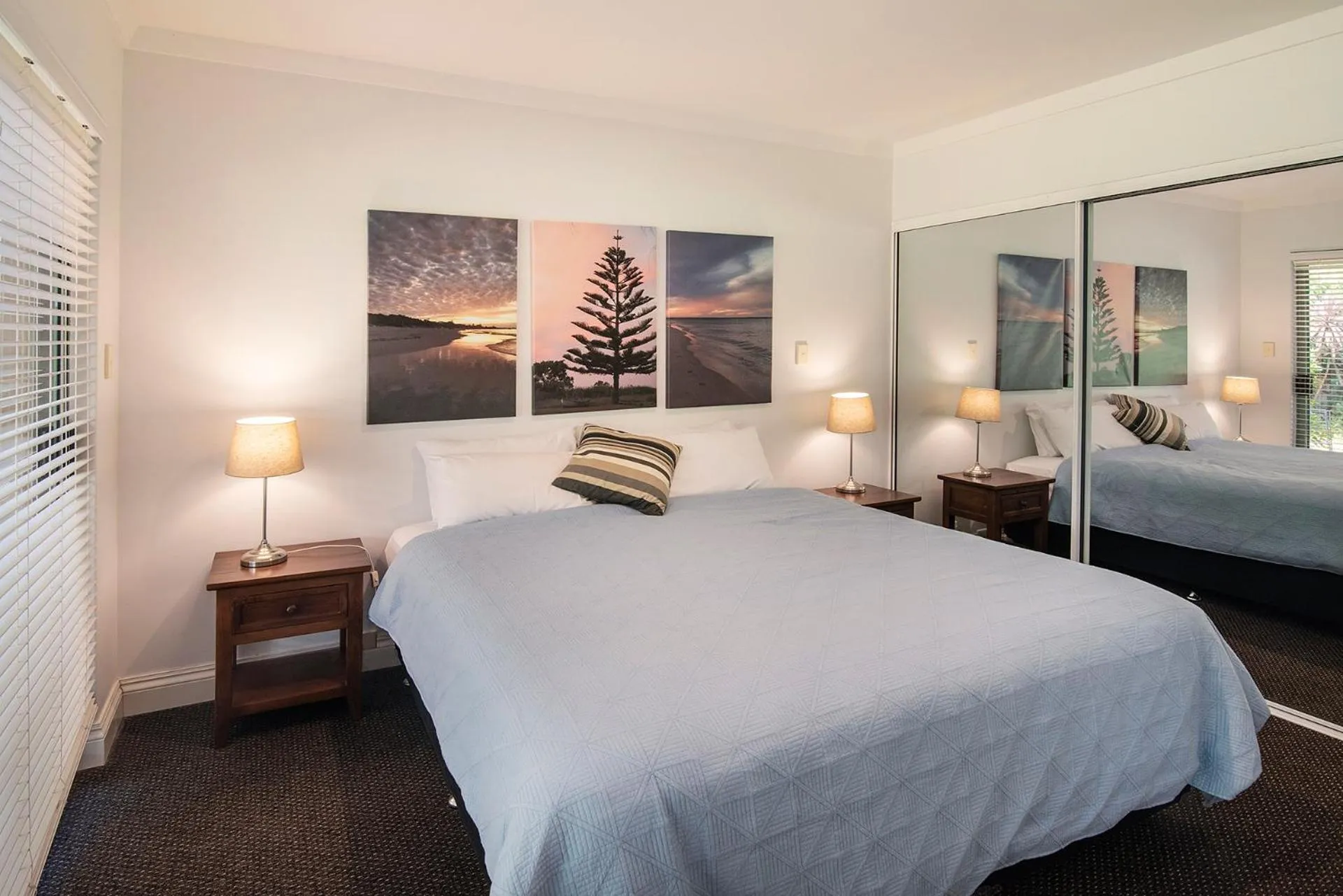 Bed in Bayshore Beachside Resort