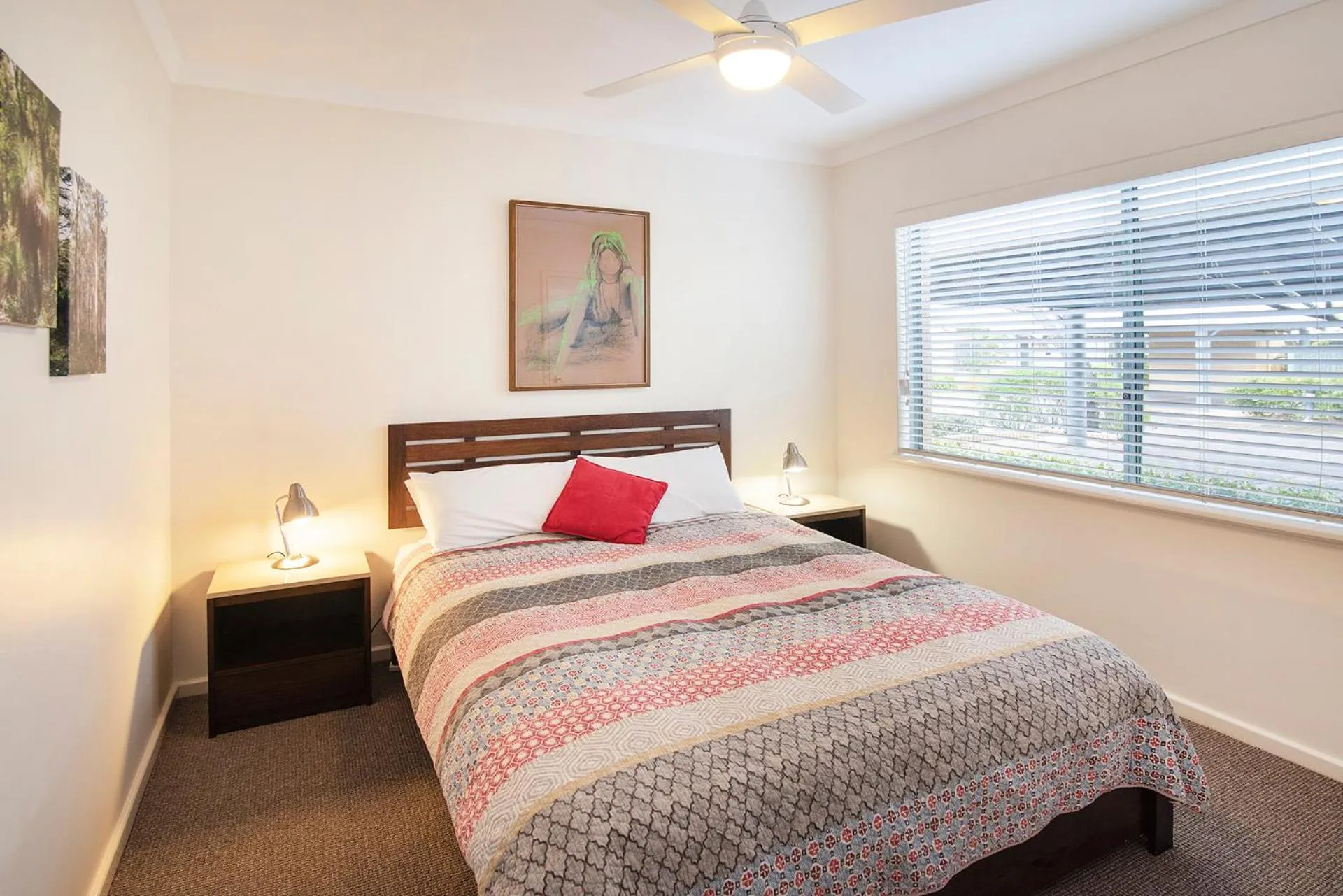 Bed in Bayshore Beachside Resort