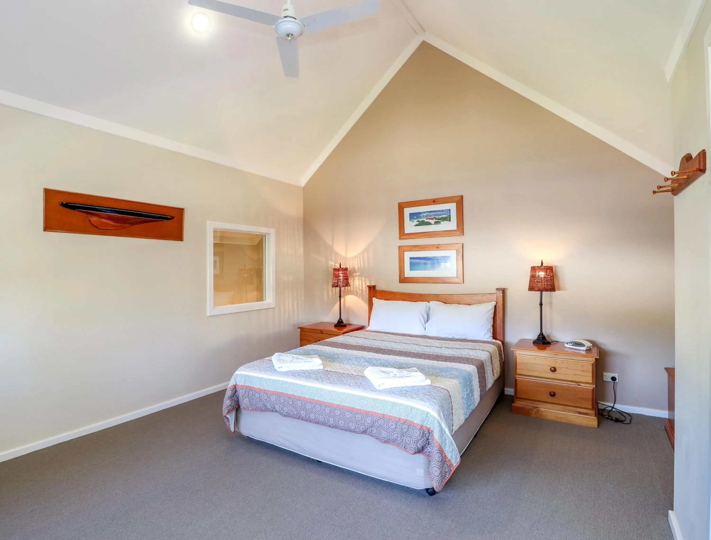 Bed in Bayshore Beachside Resort