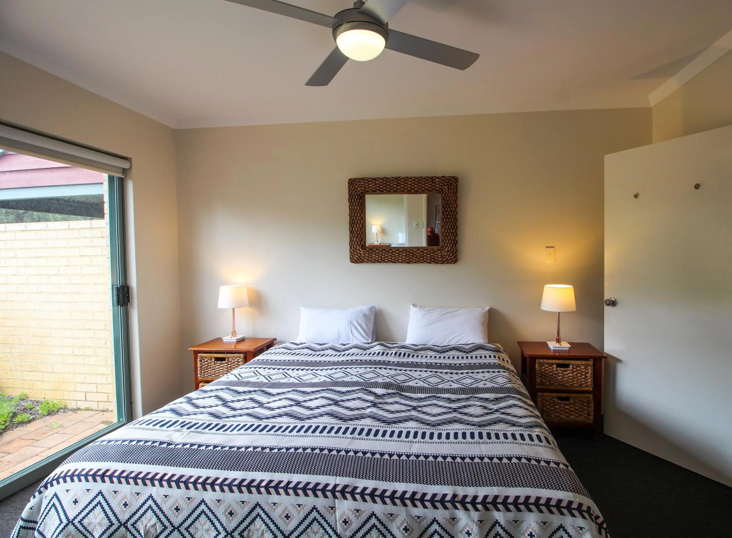 Bed in Bayshore Beachside Resort