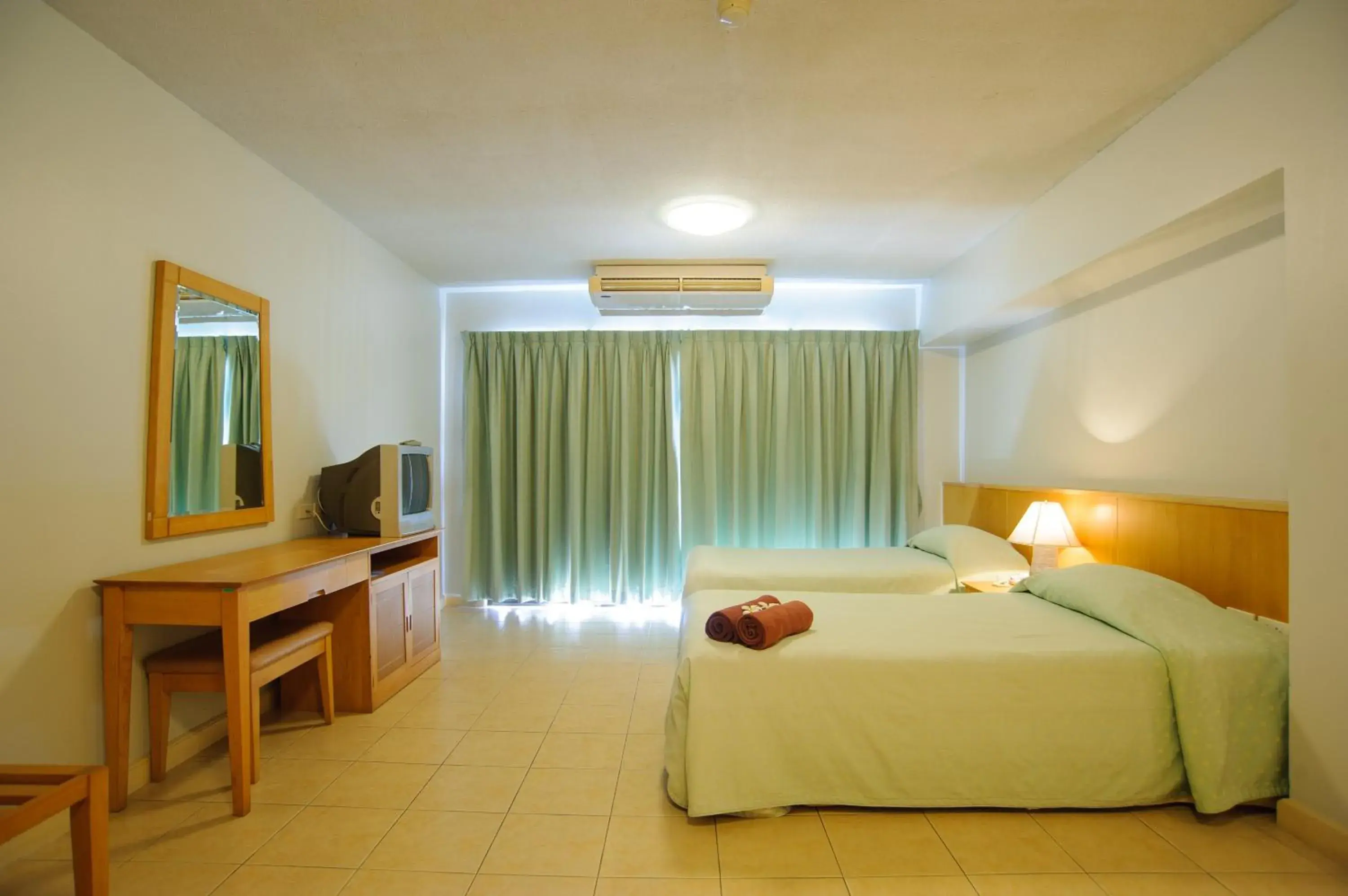 Bedroom in Diamond City Place Hotel