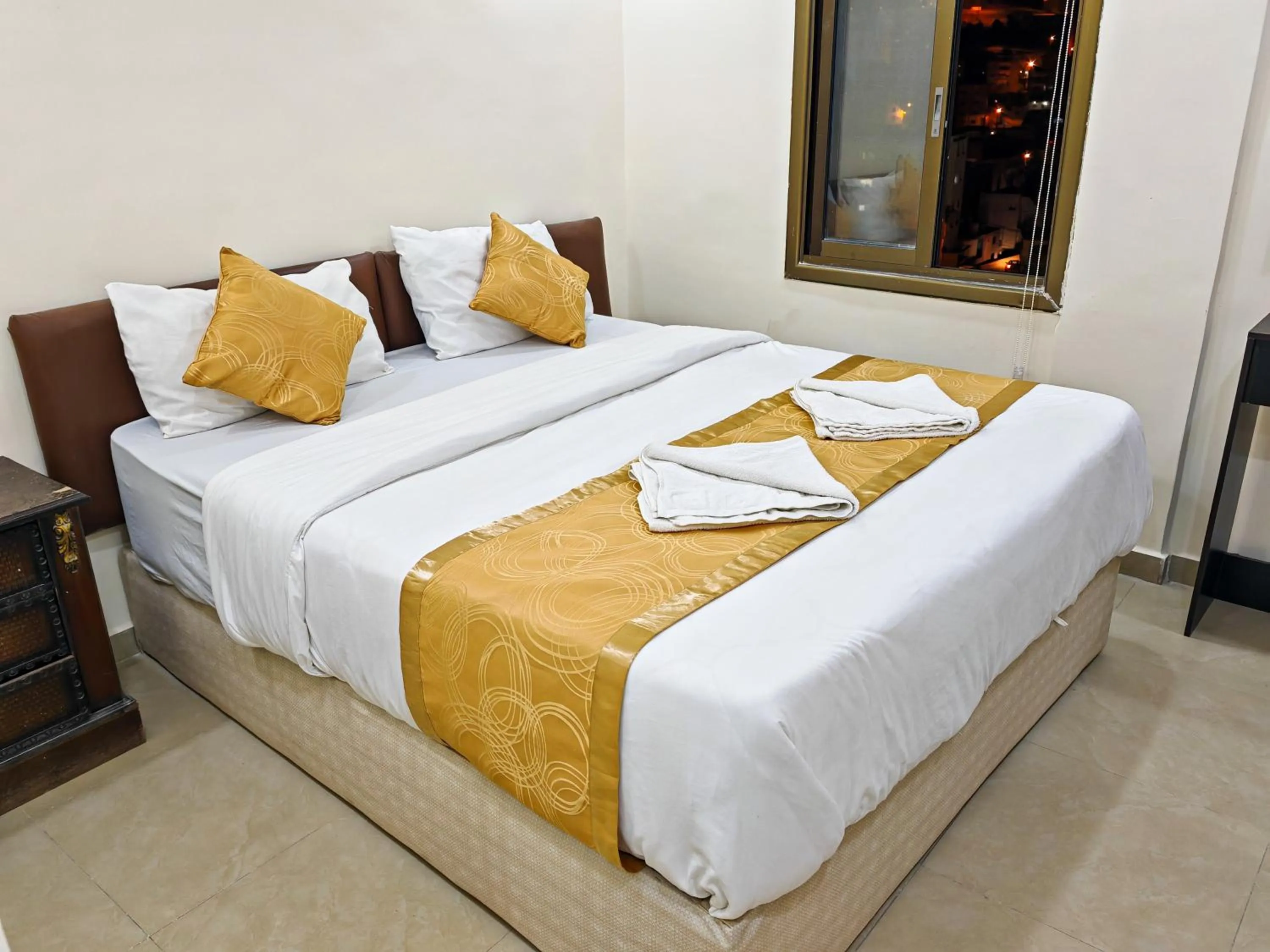 Bed in Petra Gate Hotel