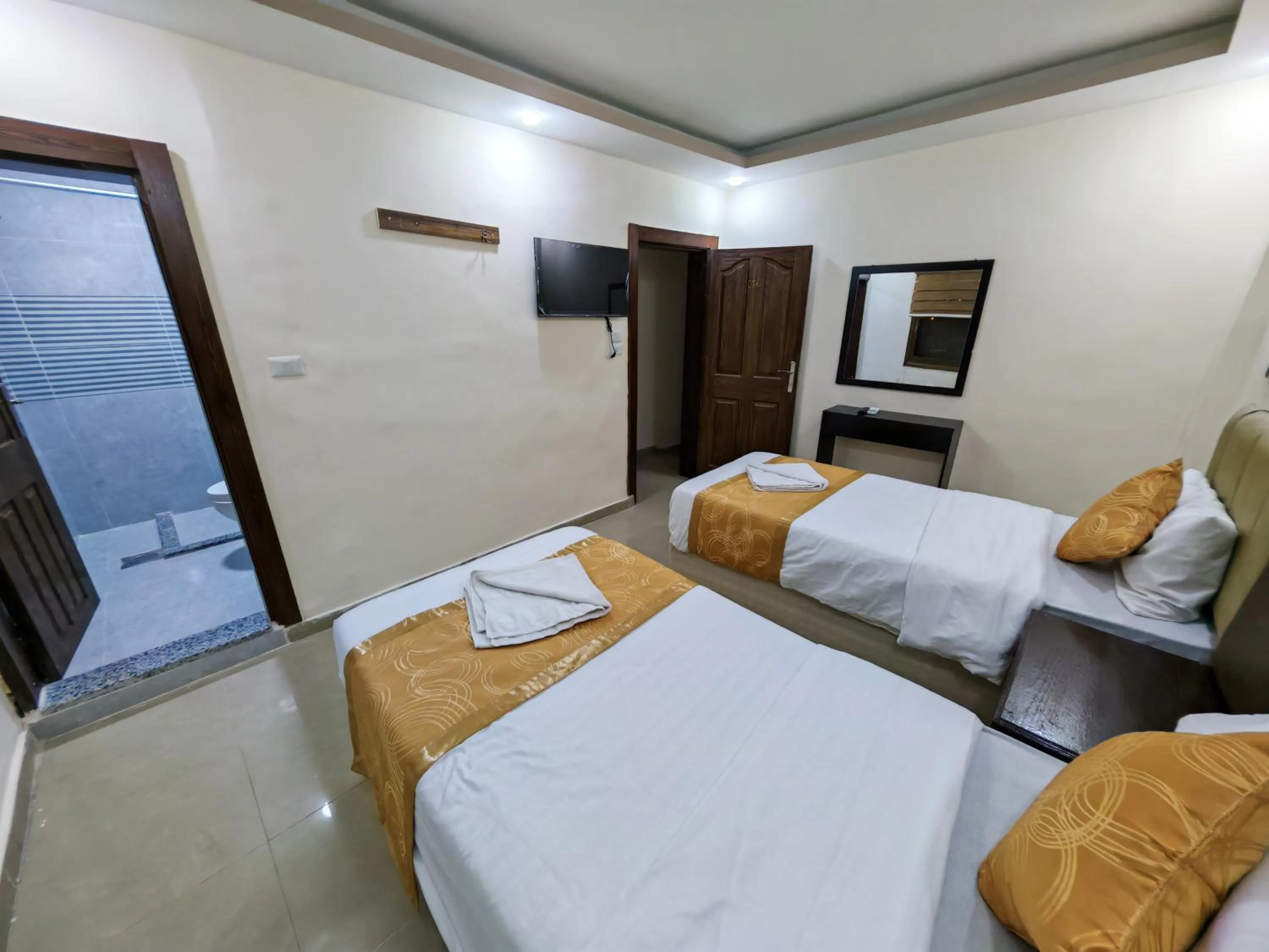 towels, Bed in Petra Gate Hotel