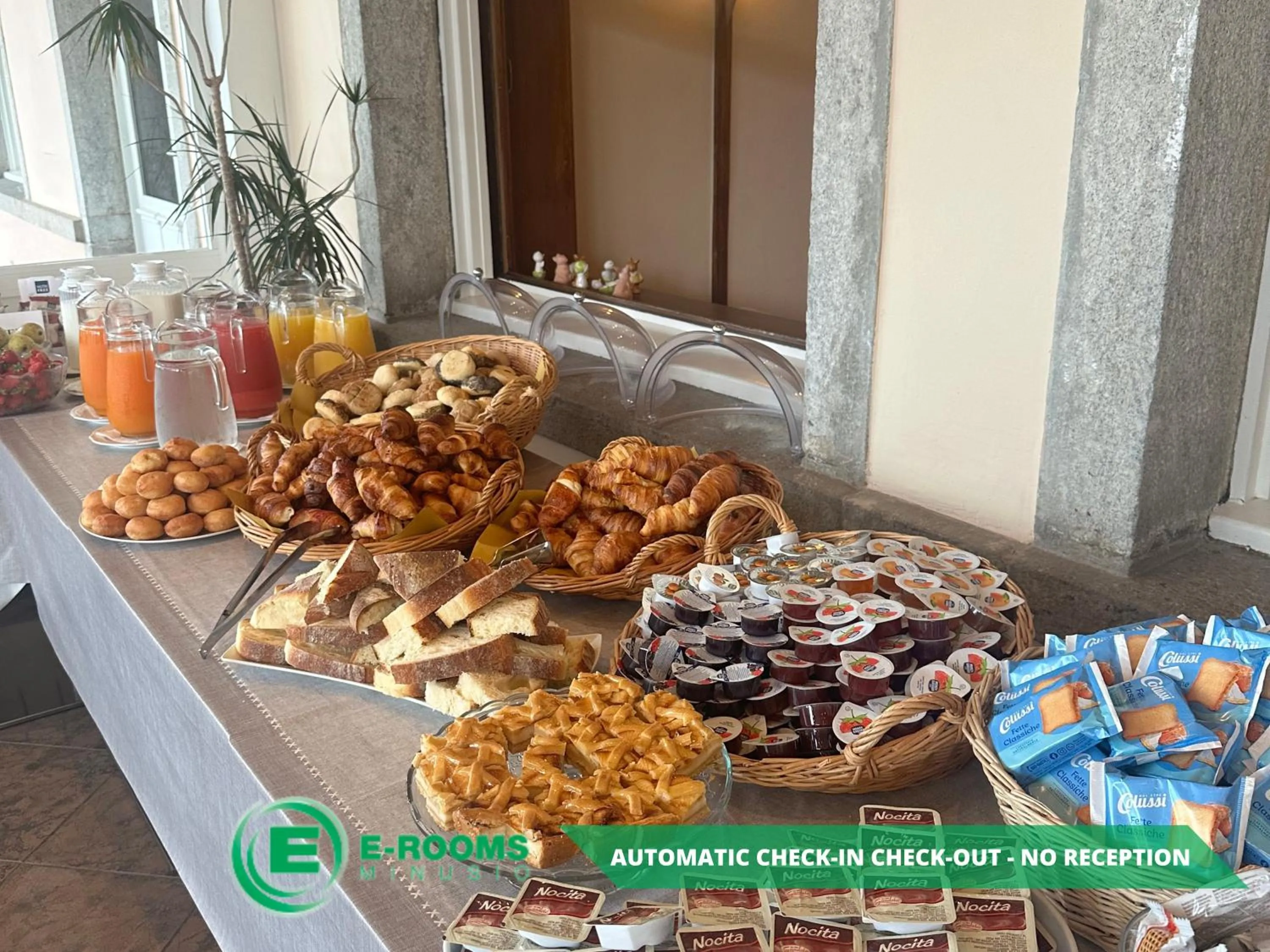 Buffet breakfast in E-Rooms Minusio