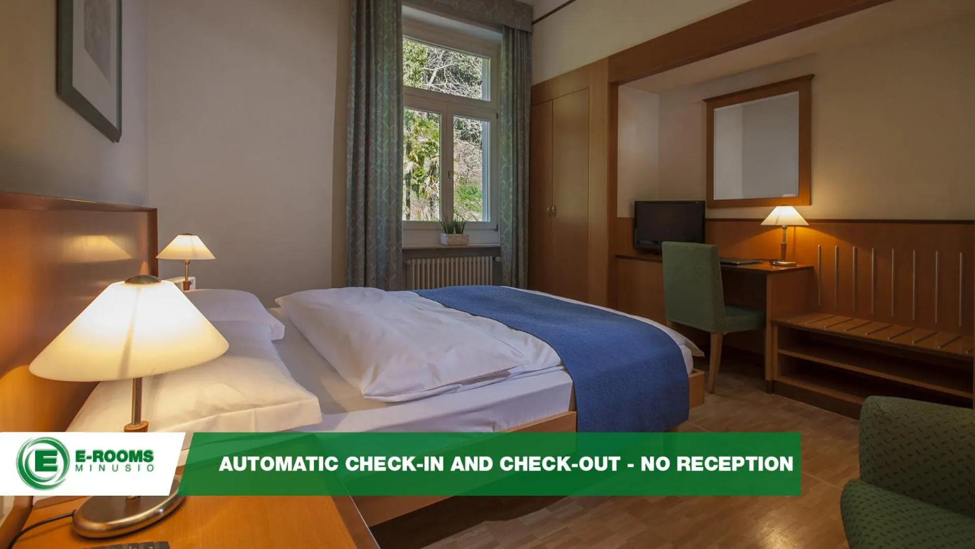 Photo of the whole room, Bed in E-Rooms Minusio