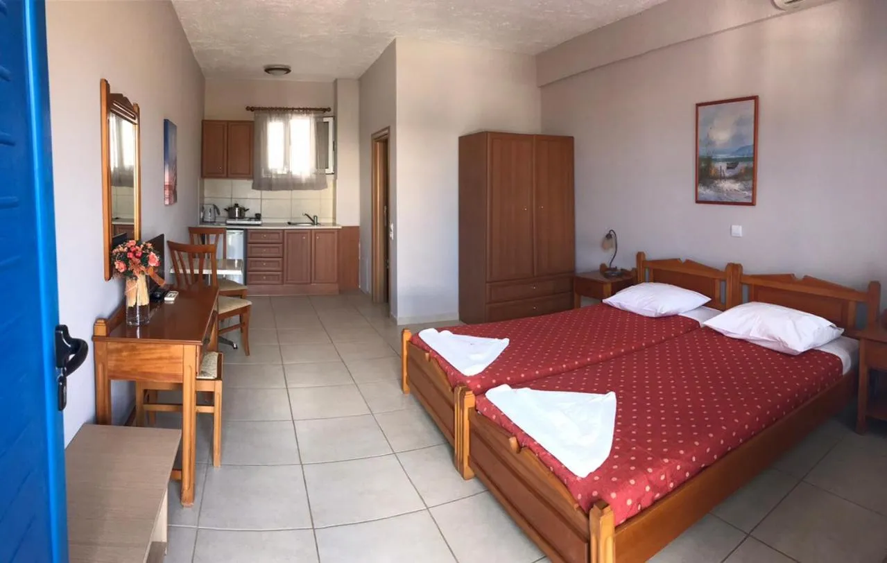 Bed in Pelagia Beach Studios