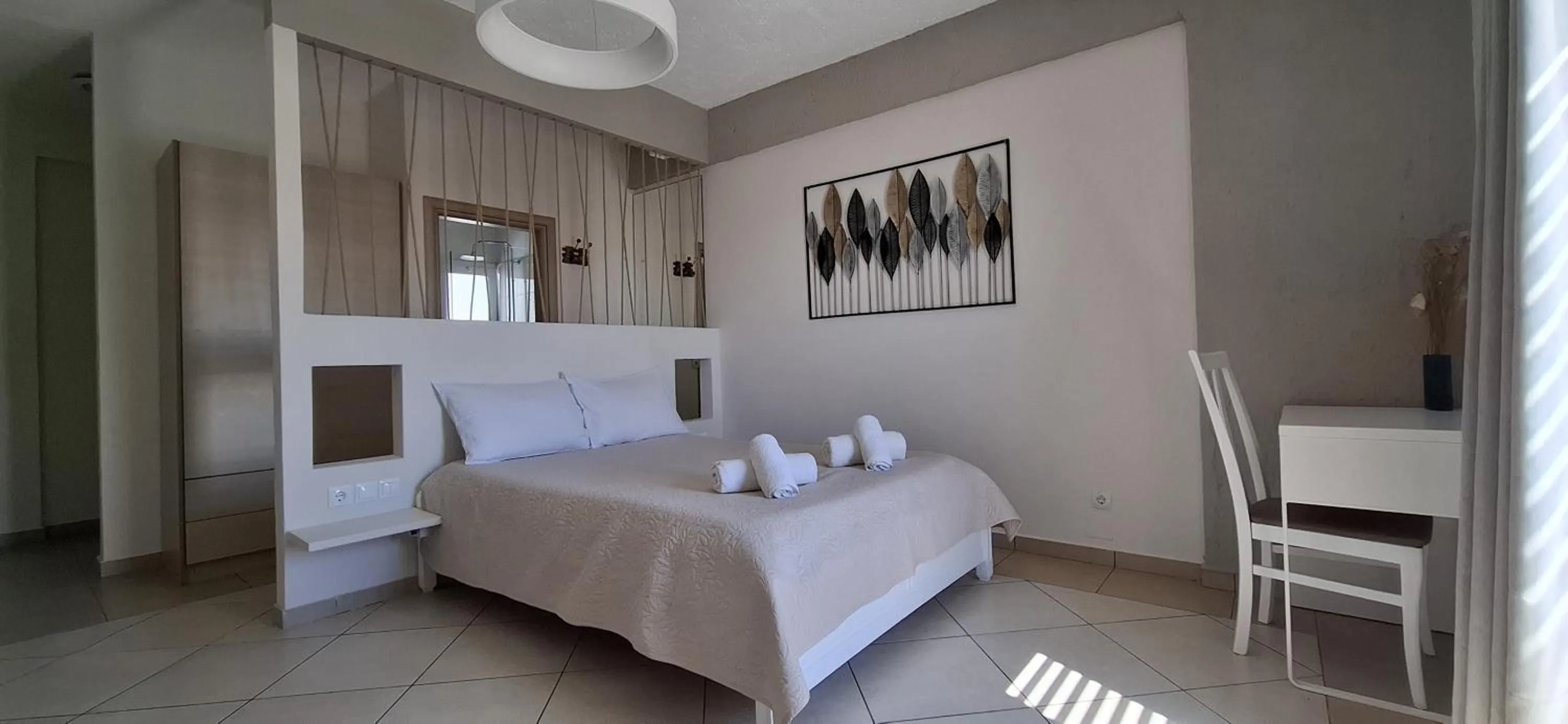 Bed in Pelagia Beach Studios
