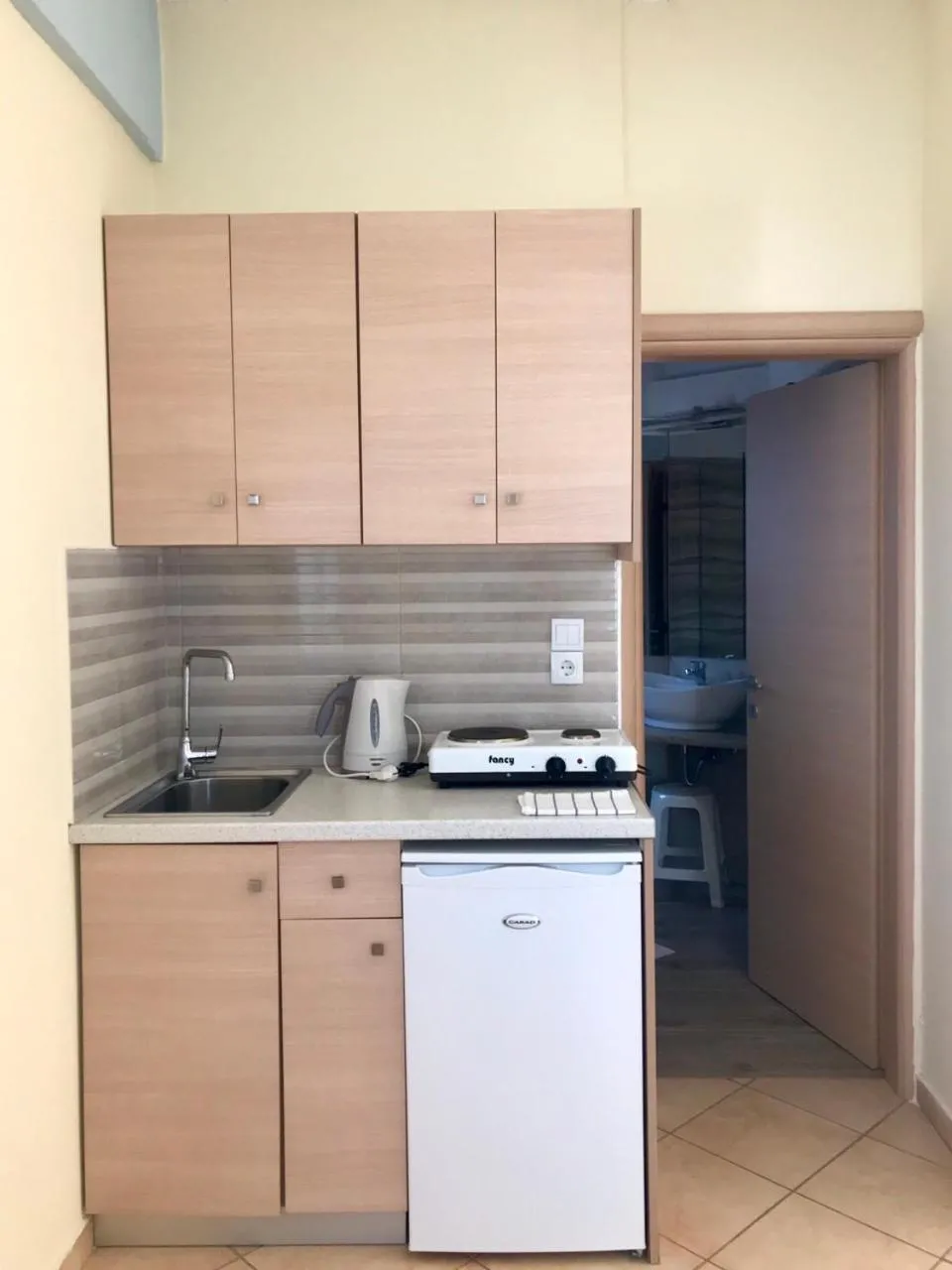 Kitchen or kitchenette in Pelagia Beach Studios