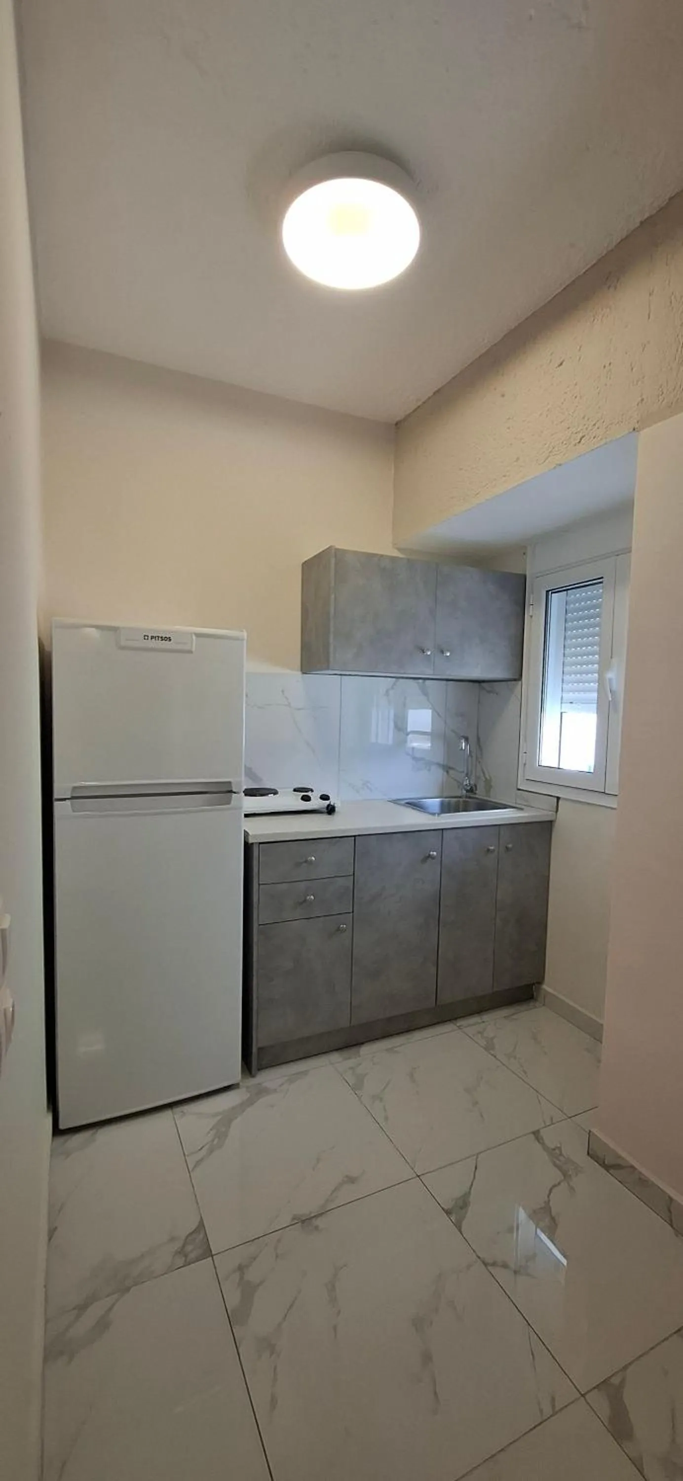 Kitchen or kitchenette in Pelagia Beach Studios