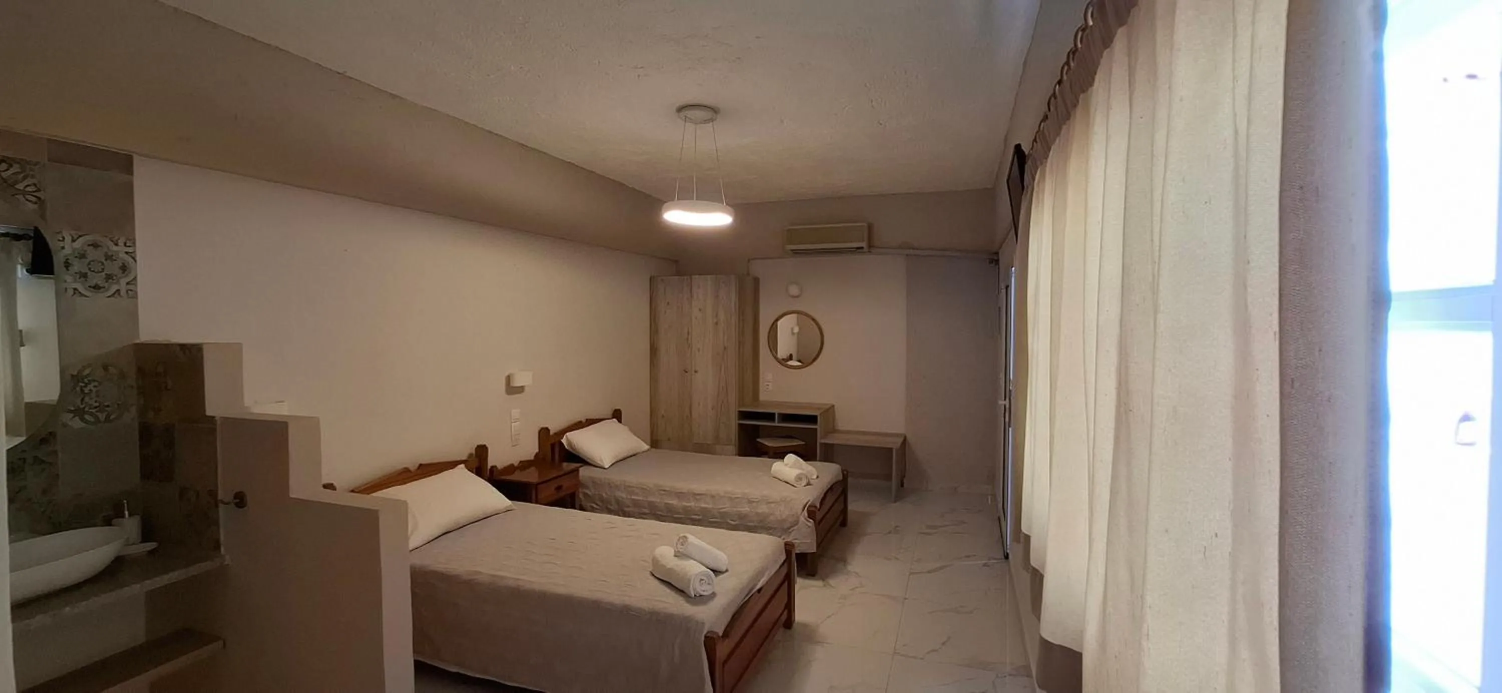 Bed in Pelagia Beach Studios