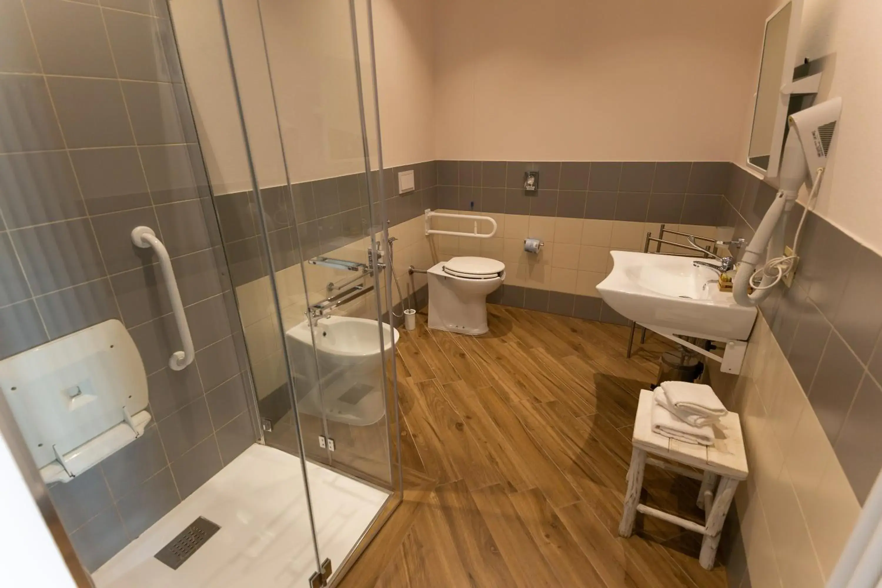 Double Room with Roll-In Shower - single occupancy - Disability Access in Fattoria L'Olmetto Double Room with Roll-In Shower - single occupancy - Disability Access in Fattoria L'Olmetto