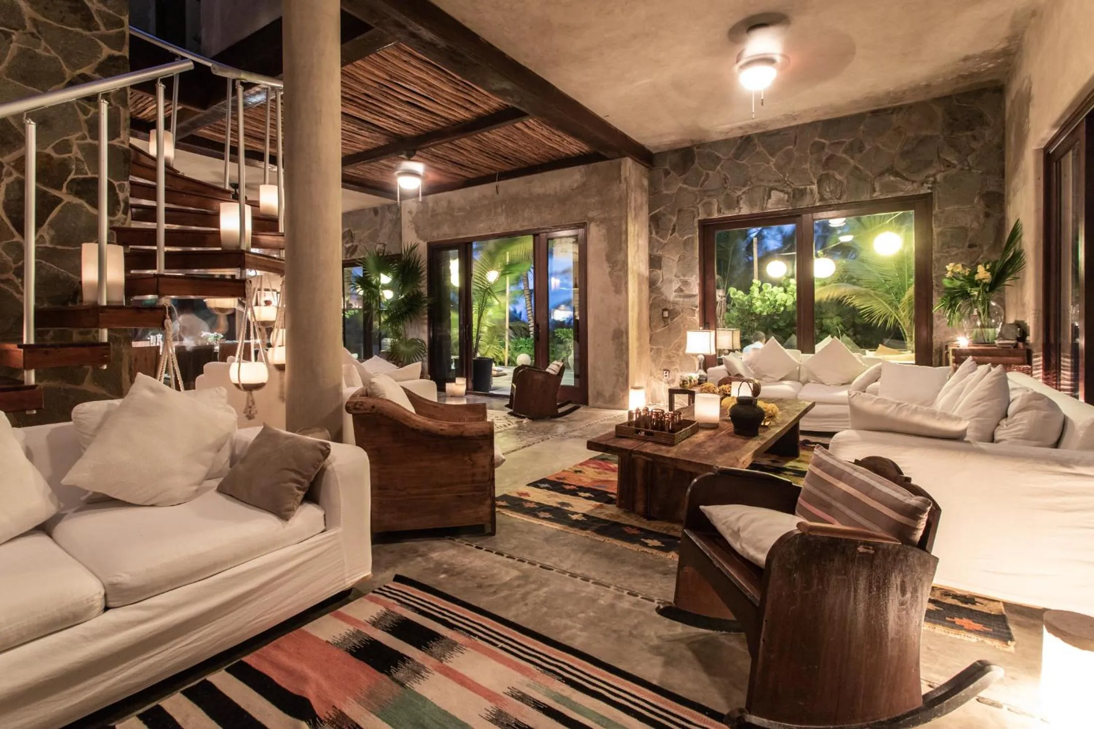 Communal lounge/ TV room in Casa Maya Kaan