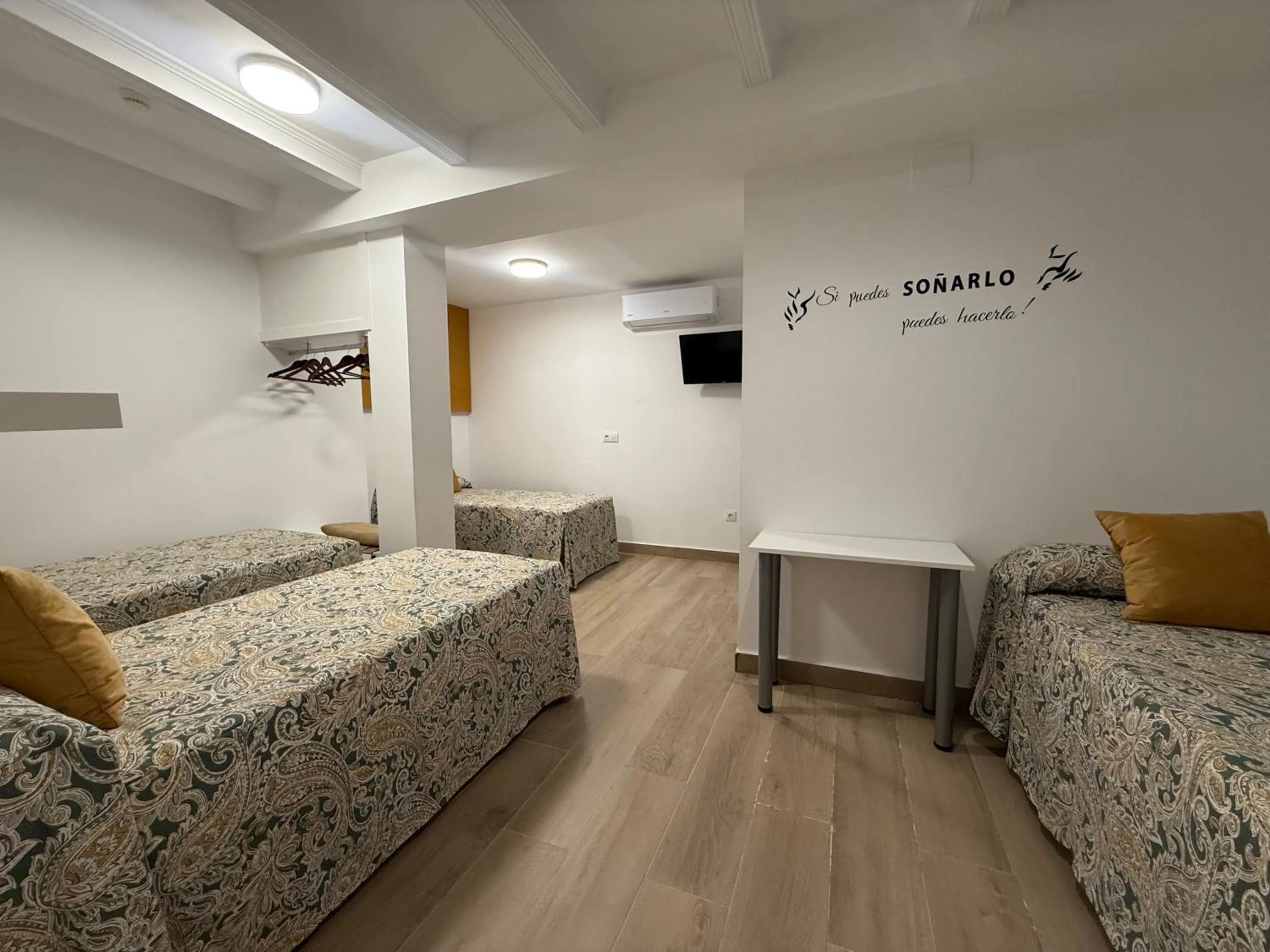 Bed in Hotel Quitagolpe