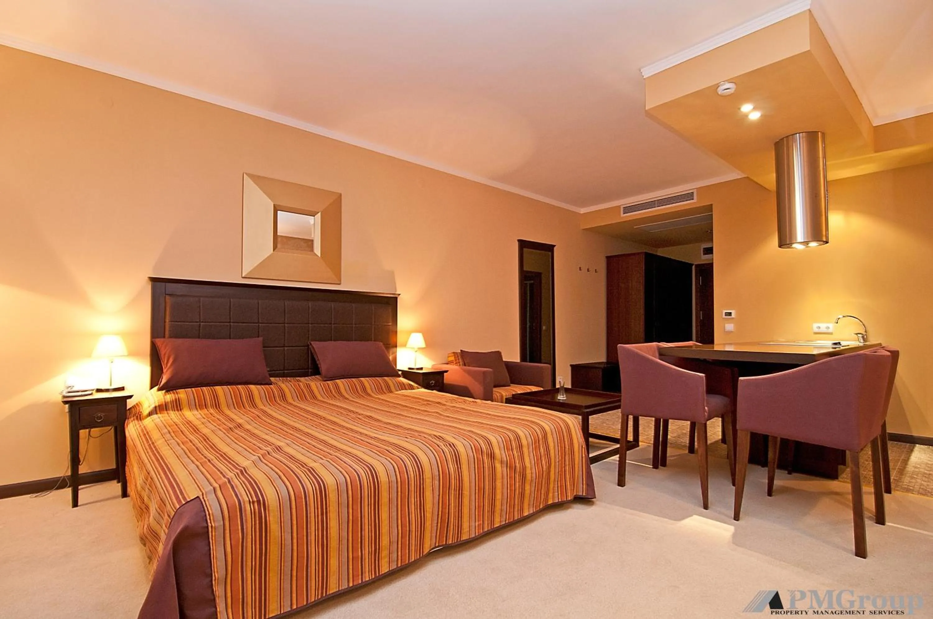 Bed in Royal Beach Apartments