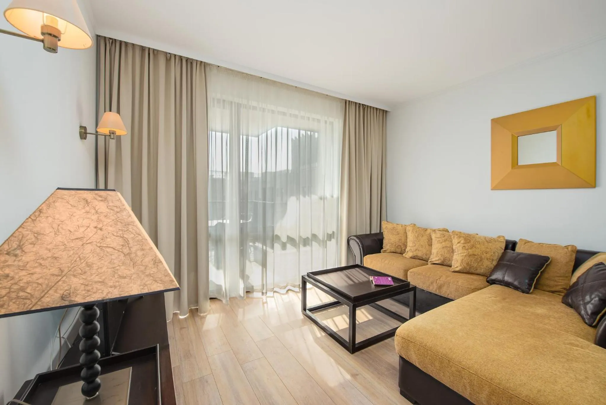 Bed in Royal Beach Apartments