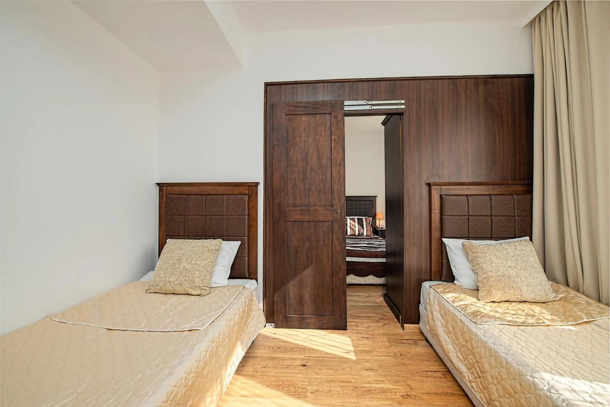 Bed in Royal Beach Apartments