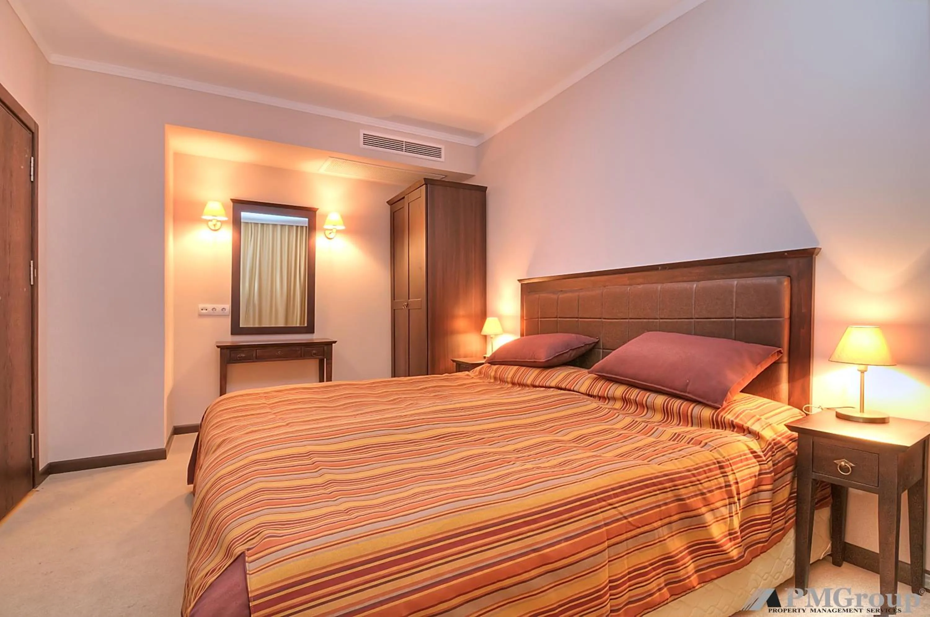 Bed in Royal Beach Apartments