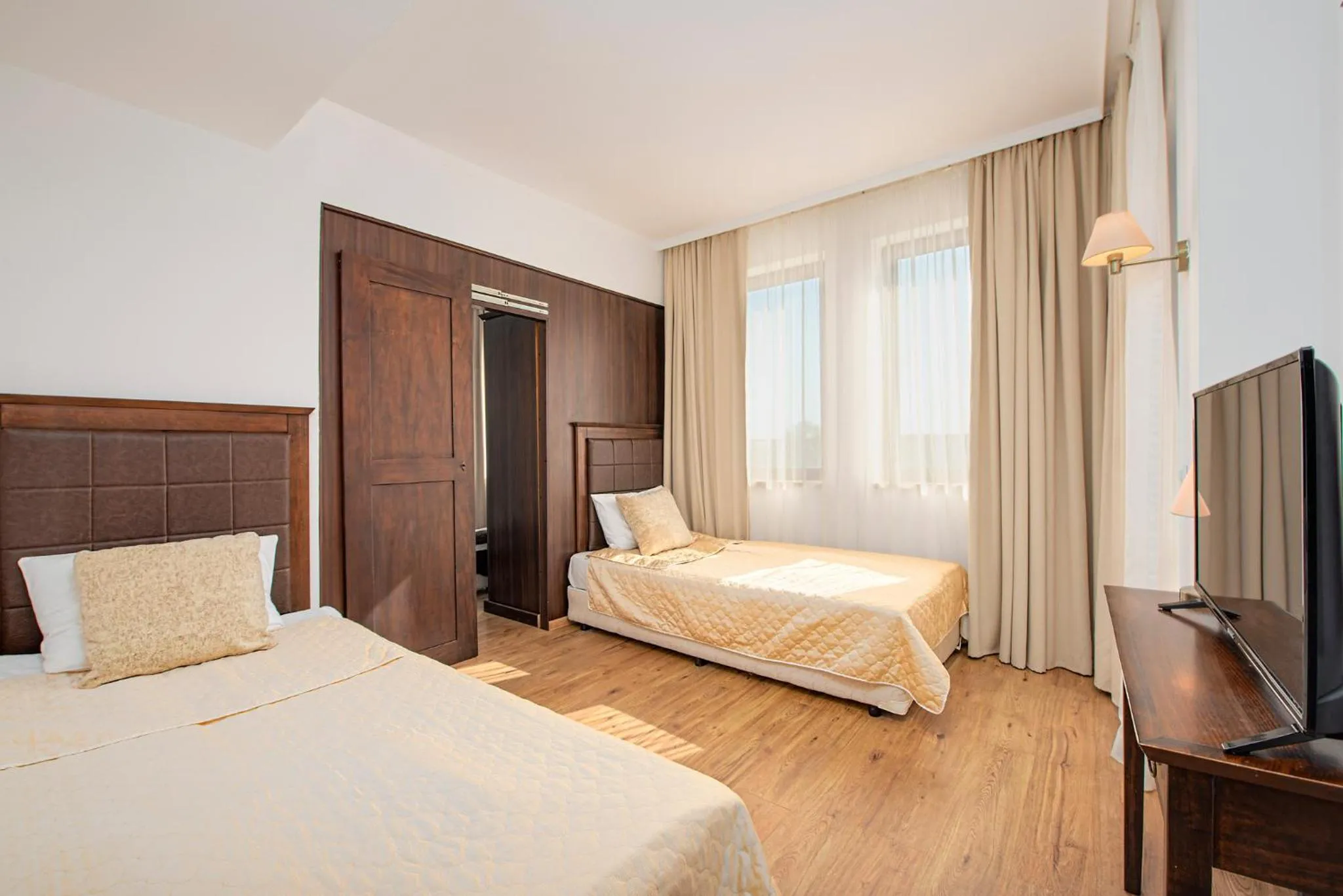 Bed in Royal Beach Apartments