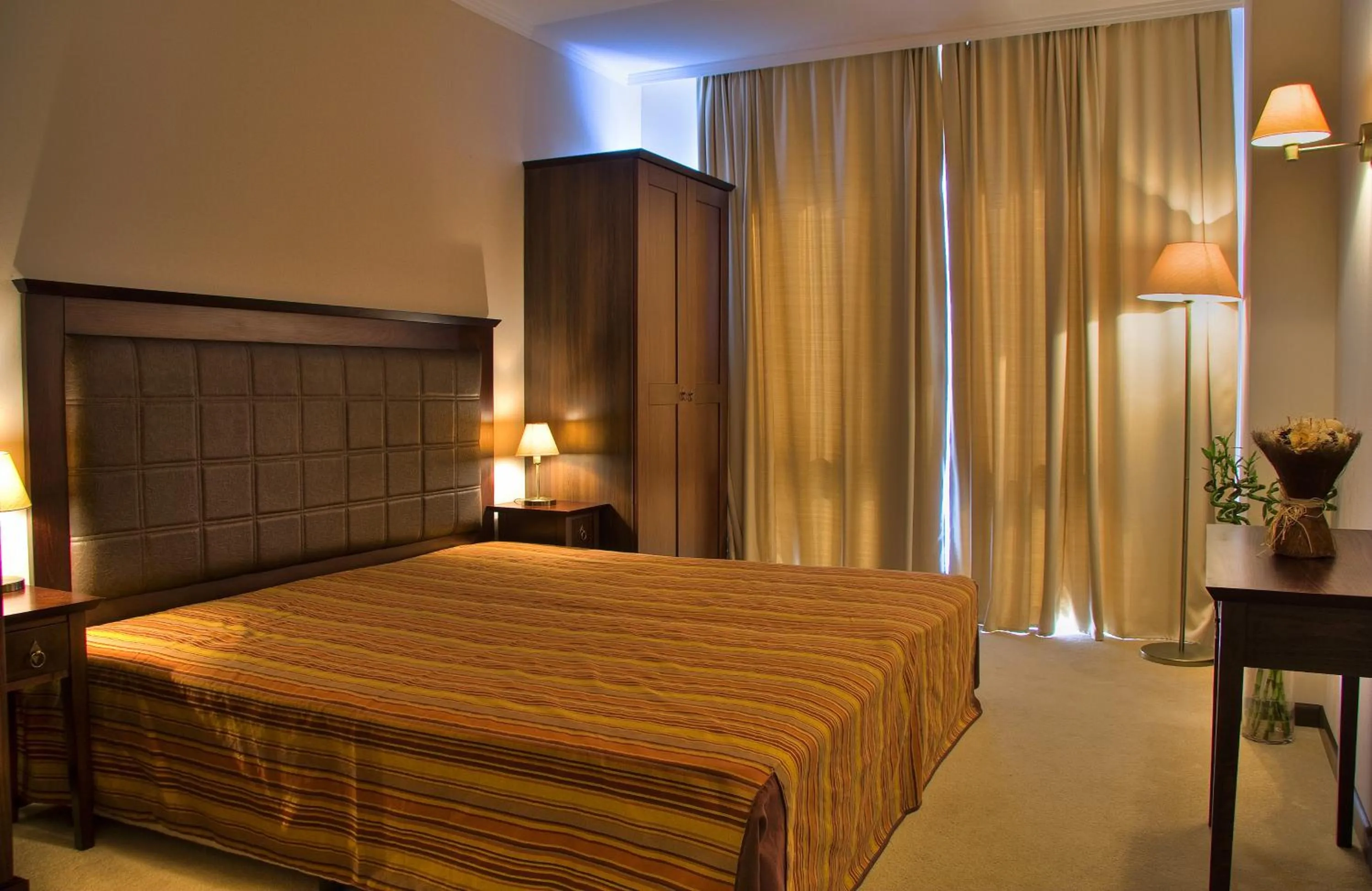 Bed in Royal Beach Apartments