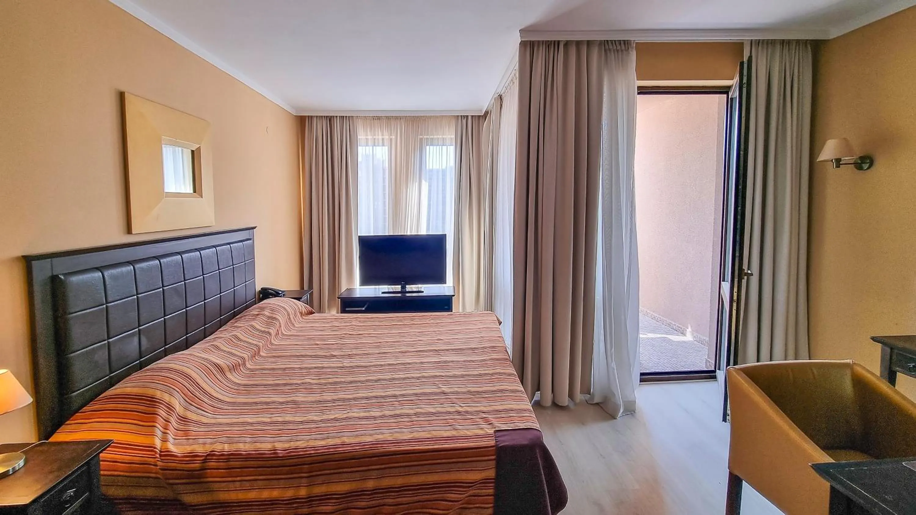 Bed in Royal Beach Apartments