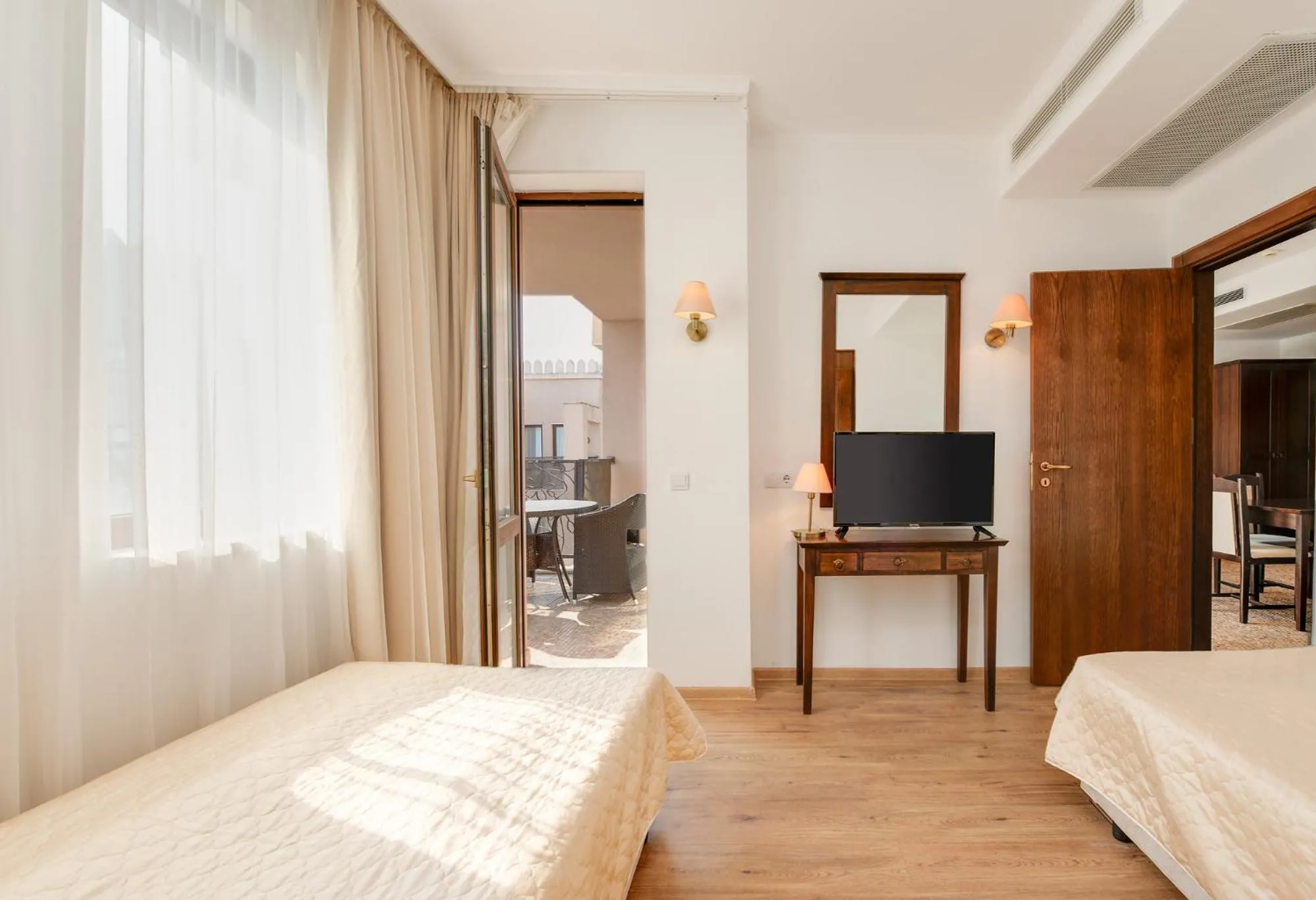 Bed in Royal Beach Apartments