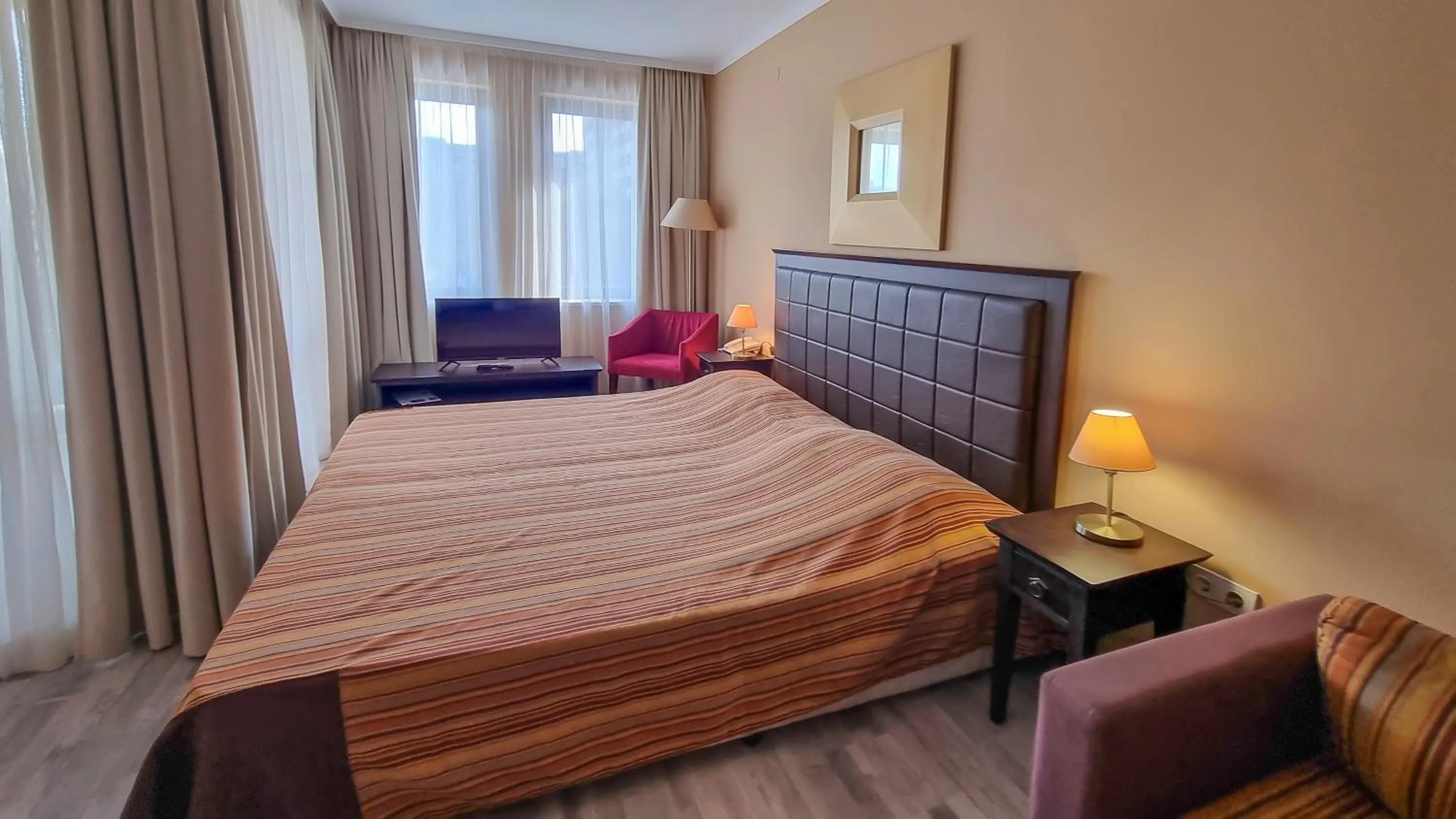 Bed in Royal Beach Apartments