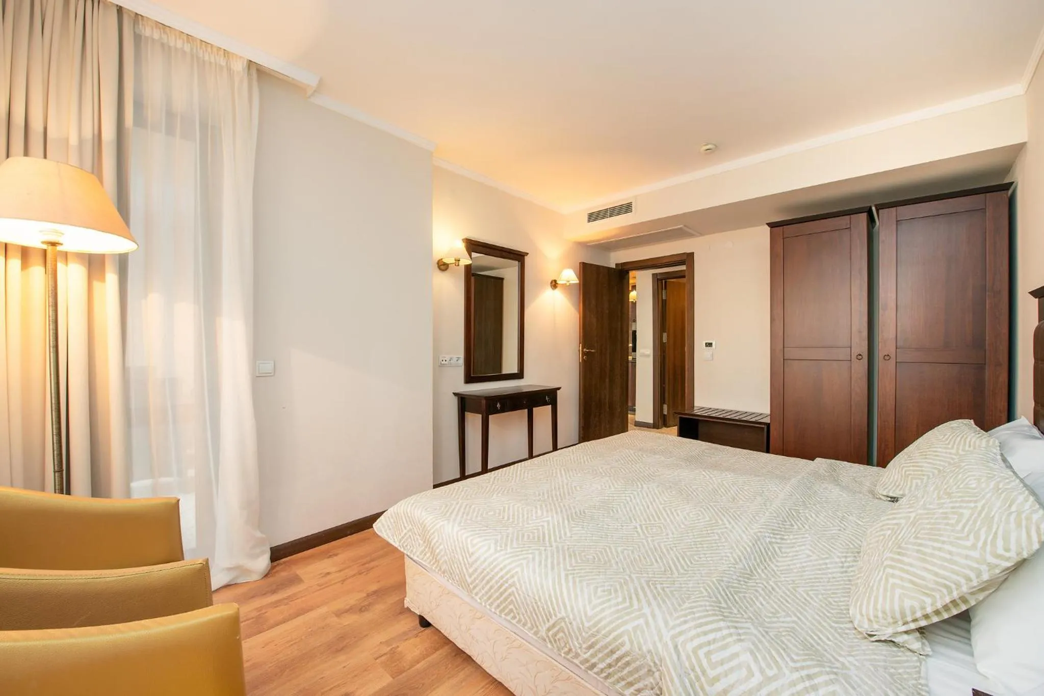 Bed in Royal Beach Apartments