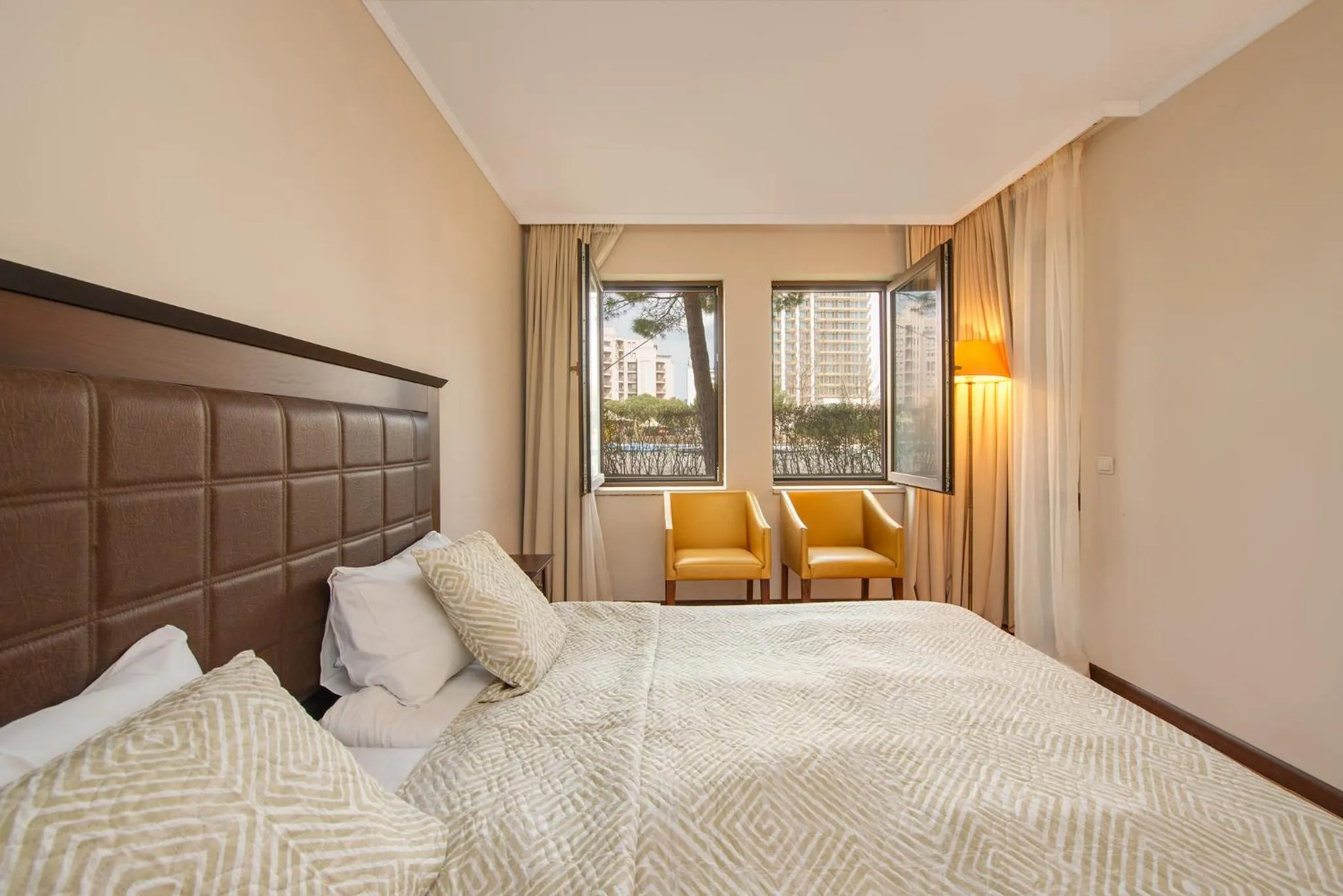 Bed in Royal Beach Apartments