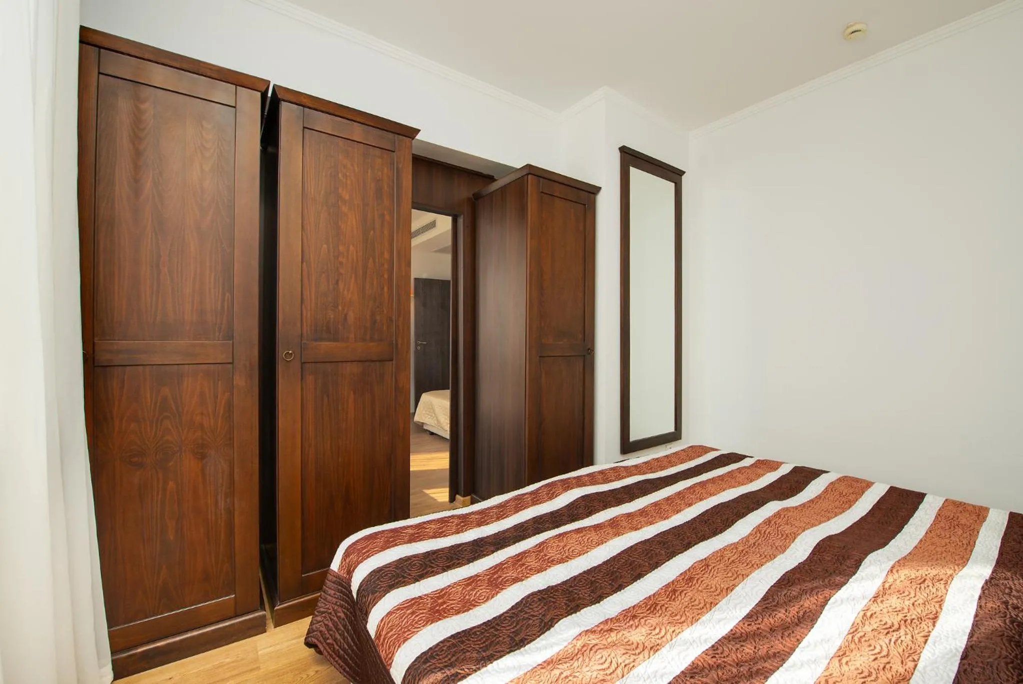 Bed in Royal Beach Apartments