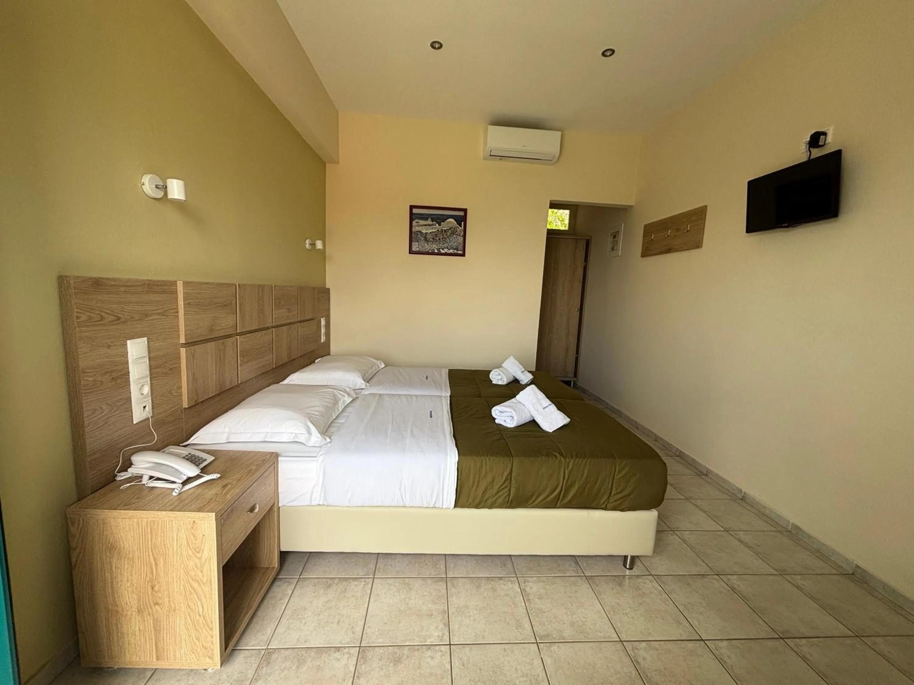 Bed in Angeliki Beach Hotel