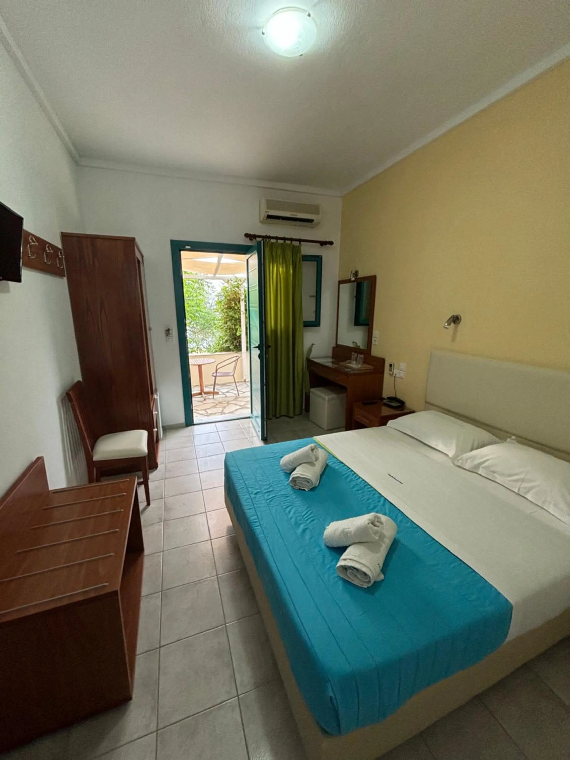 Bed in Angeliki Beach Hotel