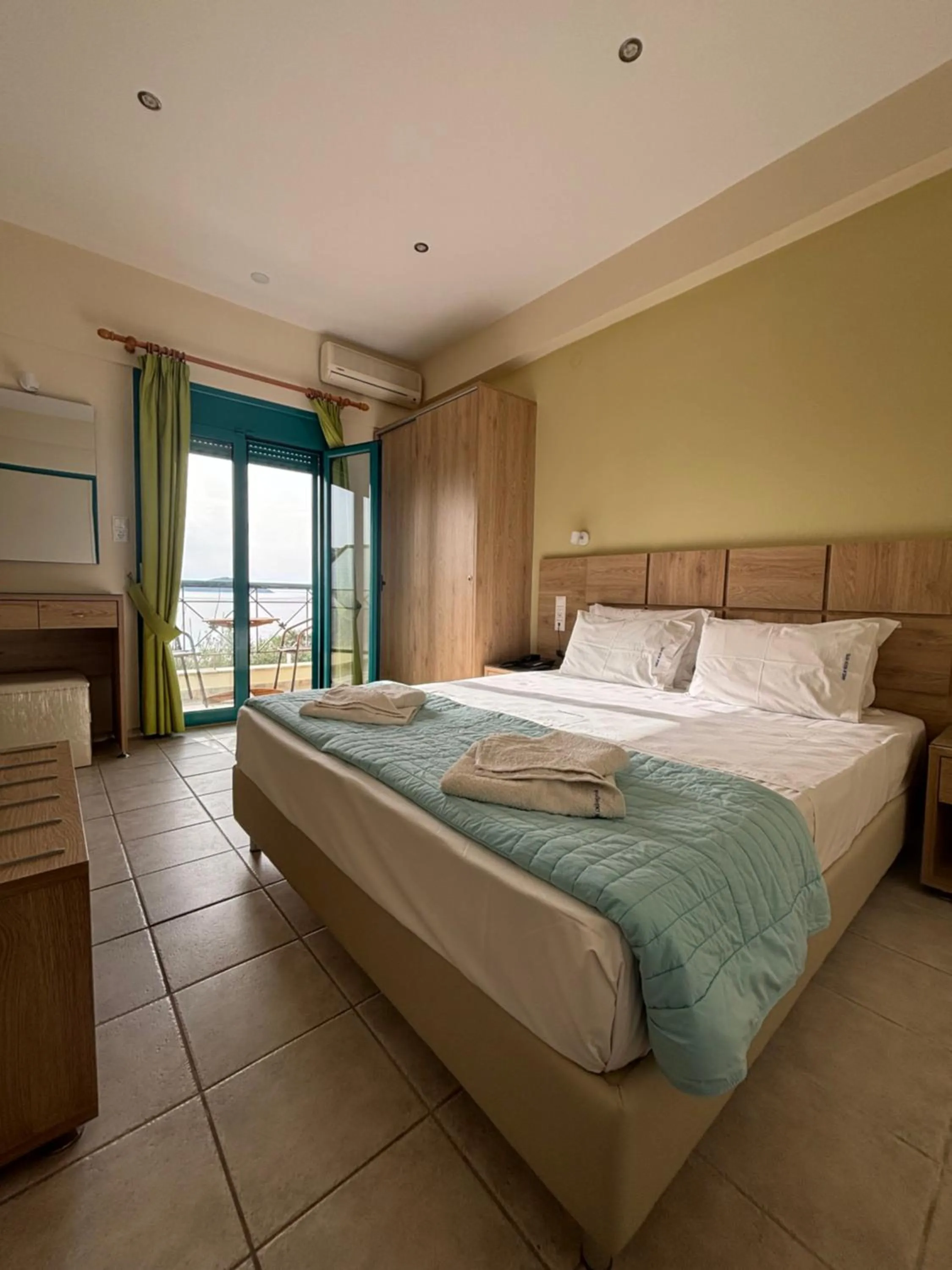 Bed in Angeliki Beach Hotel