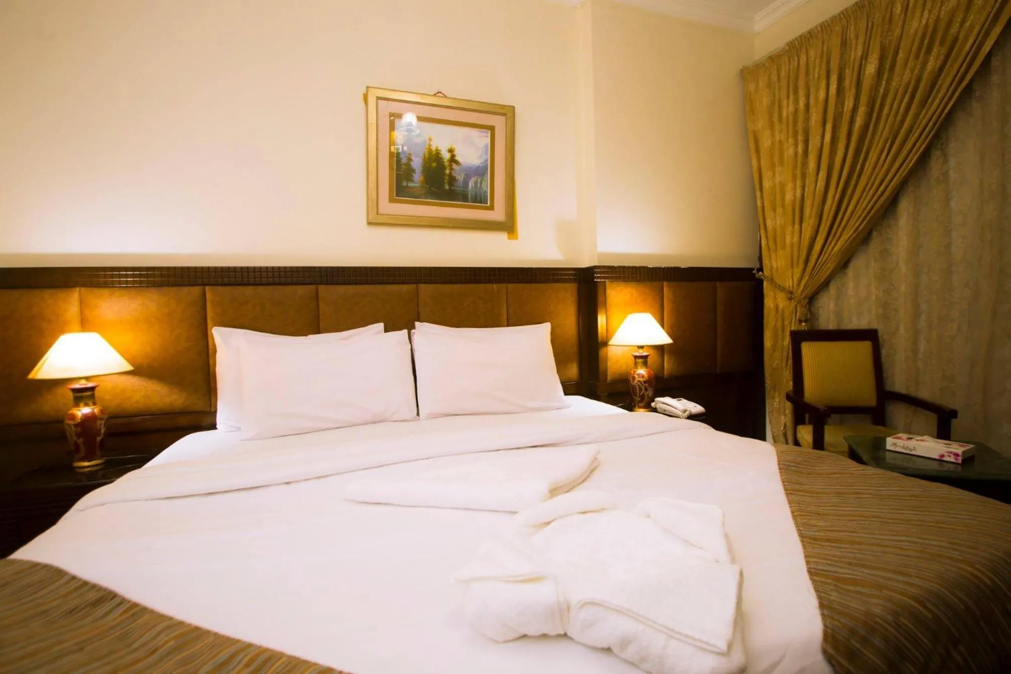 Bed in Anwar Al Zahraa Hotel