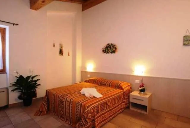 Bed in Agriturismo Corte La Sacca