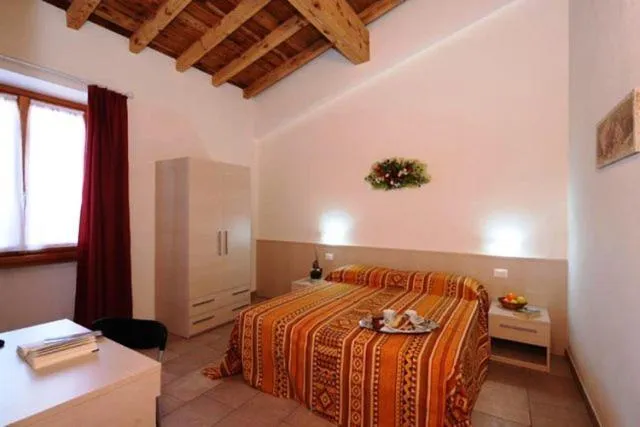Bed in Agriturismo Corte La Sacca